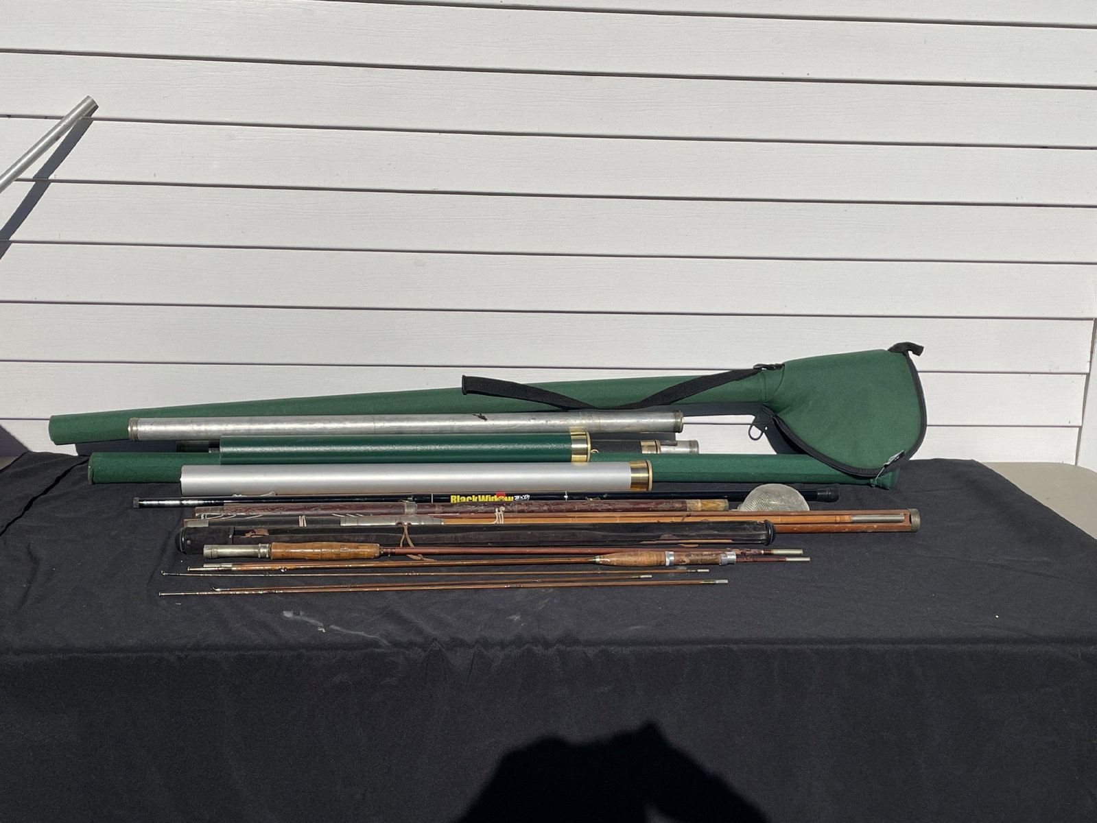 LOT OF OLDER FLY FISHING RODS AND ROD CASES: LOT OF OLDER FLY FISHING RODS AND ROD CASES
