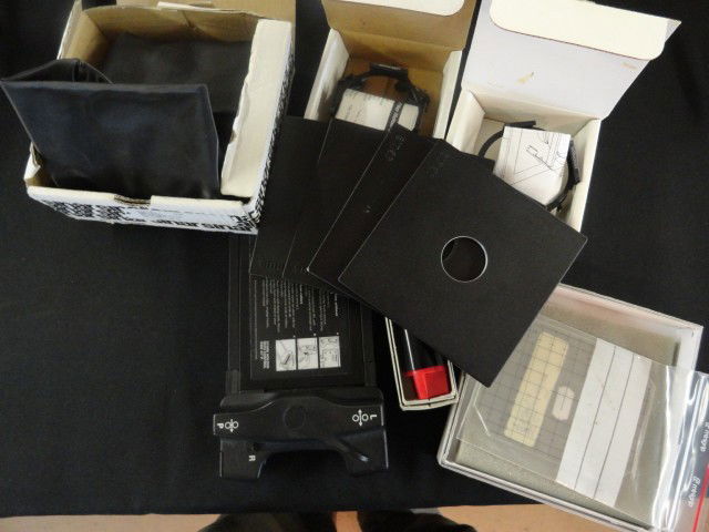 SINAR ACCESSORIES: 4 SINAR LENS BOARDS, 1 6": SINAR ACCESSORIES: 4 SINAR LENS BOARDS, 1 6" EXTENSION RAIL, 1 4x5 BAG BELLOWS, 1 GROUND GLASS, 1 4x5 POLAROID BACK