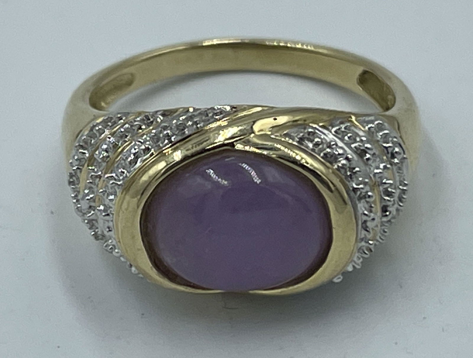 A 10K GOLD RING WITH PURPLE STONE (1 of 4)