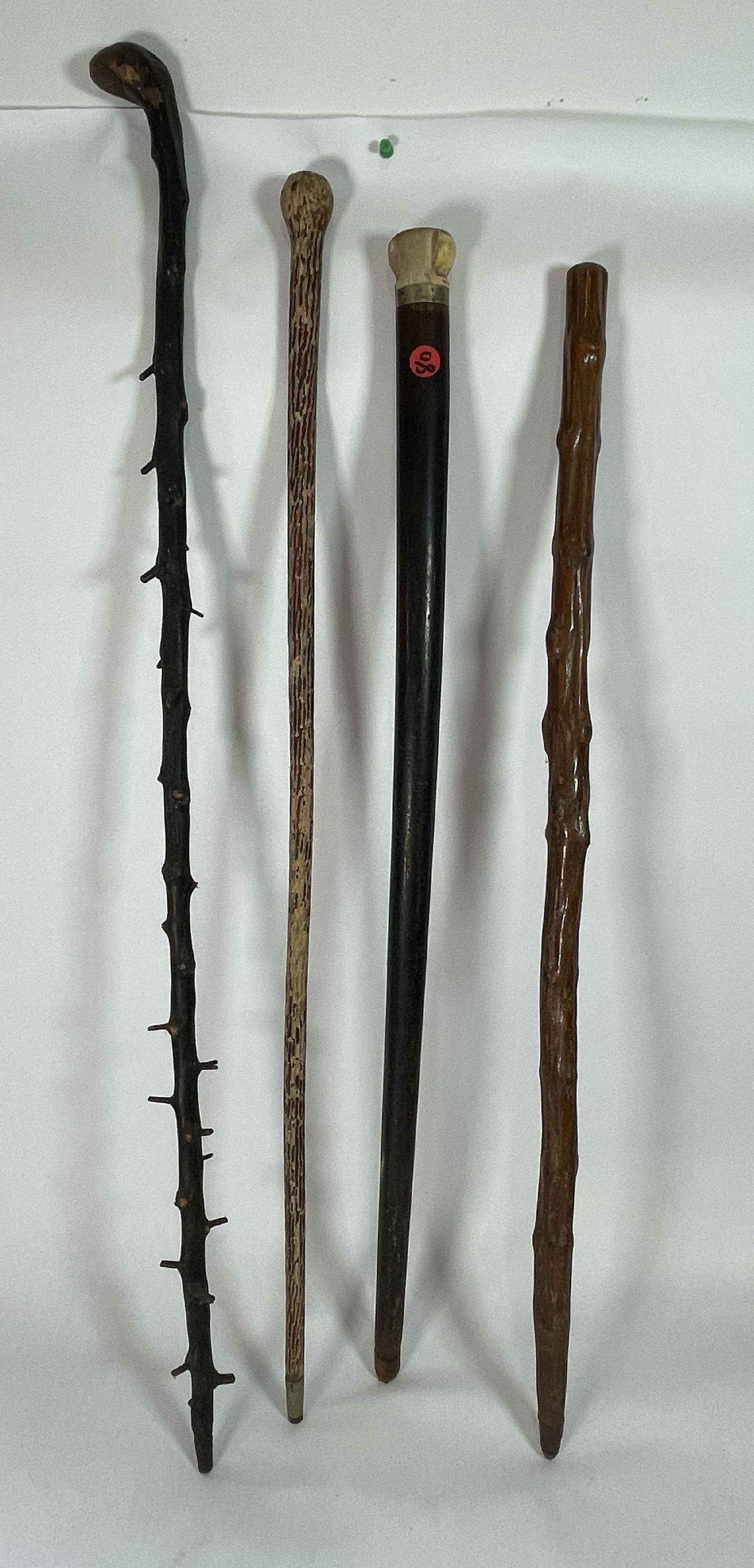 FOUR EARLY AMERICAN WALKING STICKS ONE INSCRIBED TO ENOCH BADGER, 34" AND SMALLER (1 of 6)