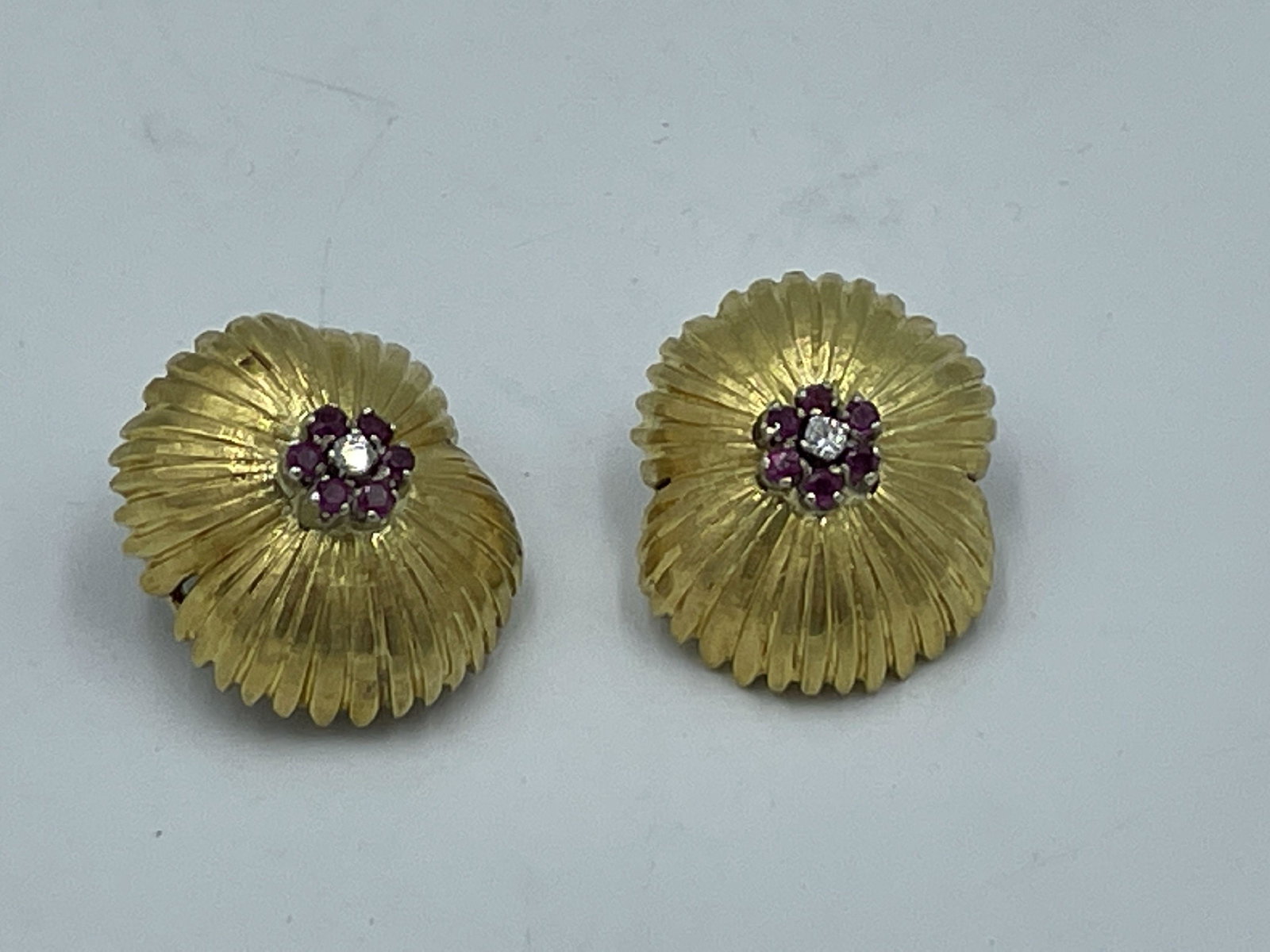 A PAIR OF RUBY AND DIAMOND EARRINGS EACH CONTAINING A TOTAL OF 1 FC ROUND DIAMOND WEIGHING A TOTAL (1 of 4)