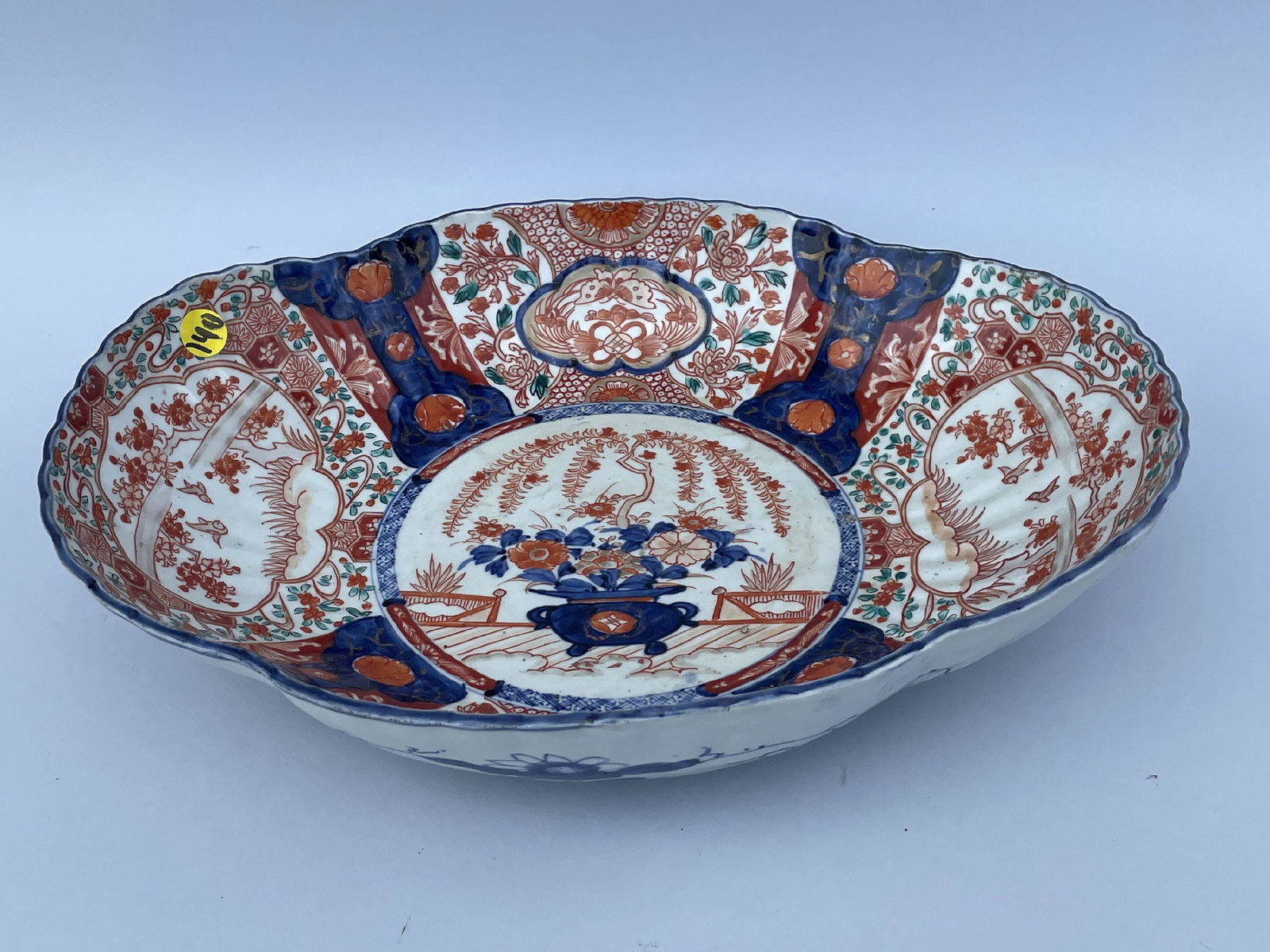 A LARGE ANTIQUE IMARI CHARGER, 15" X 12" X 3.75" (1 of 10)