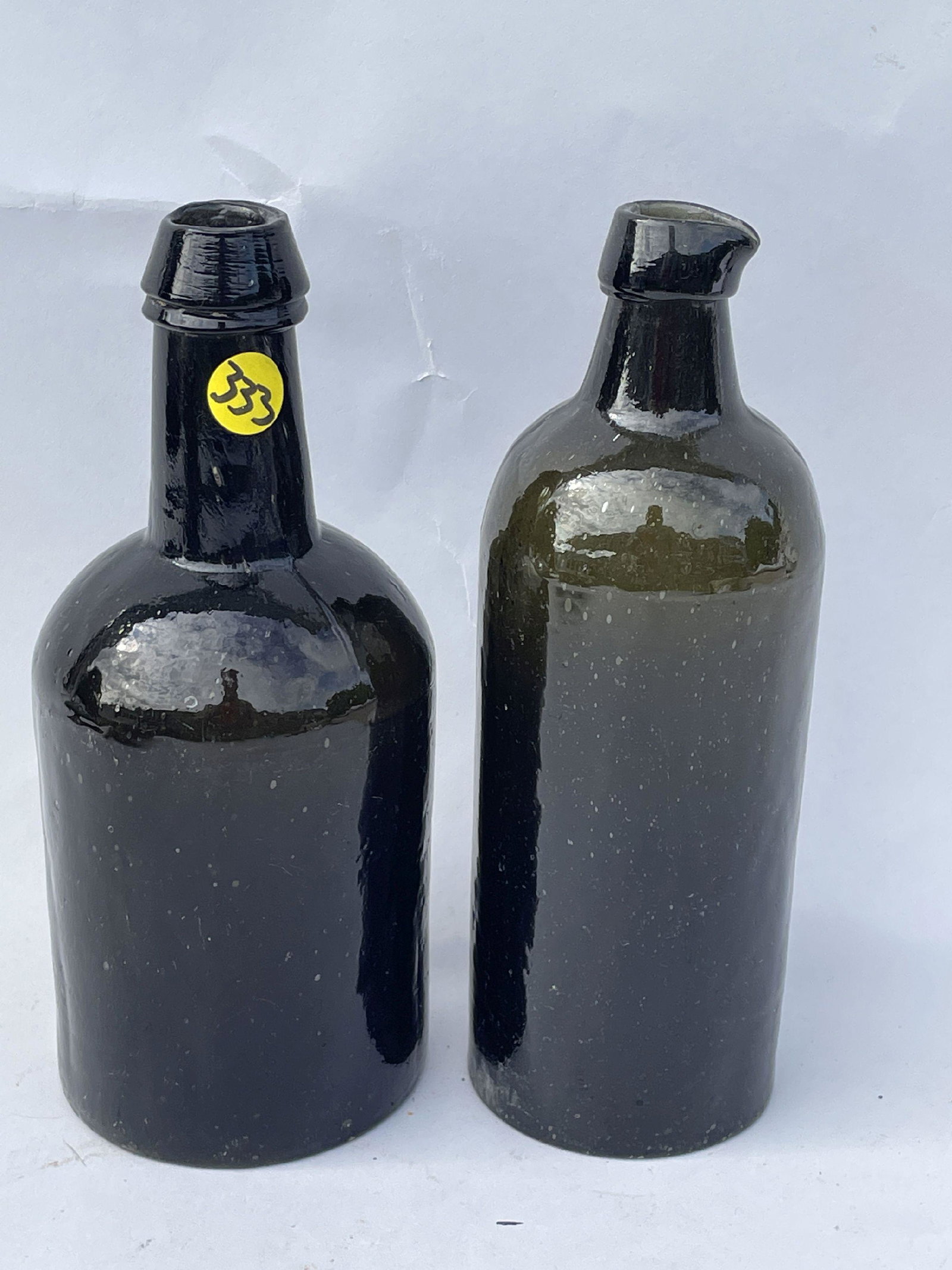 TWO EARLY OLIVE GREEN BOTTLES (1 of 5)