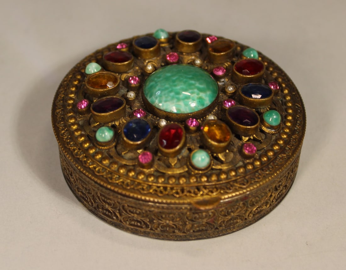 CONTINENTAL BEJEWELED GILT METAL TRINKET BOX W/ COLORED STONES, 3" DIAMETER (1 of 4)