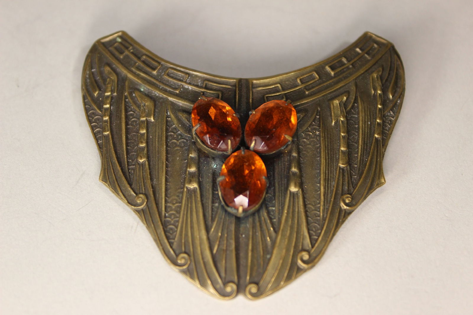 VICTORIAN SHIELD FORM GILT BRASS AND GLASS SASH PIN, 3" WIDE (1 of 2)