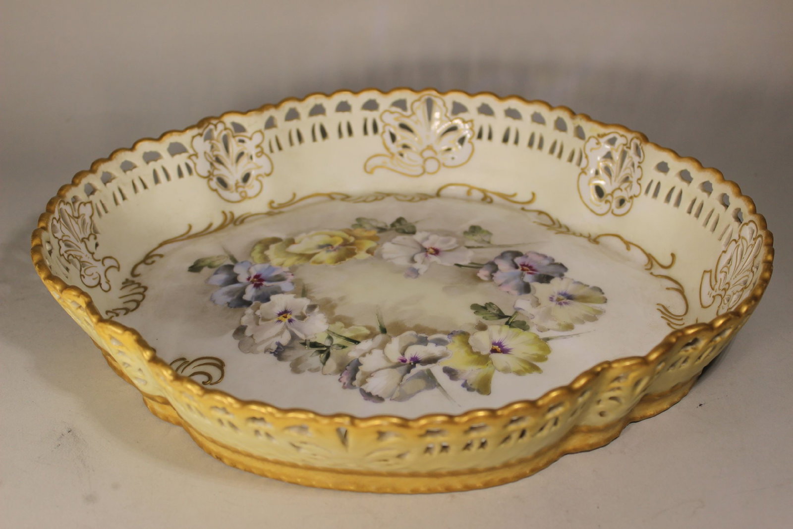 PAIRPOINT LIMOGES HP LATTICED BASKET SERVING BOWL DECORATED WITH PANSIES, 12" X 10": PAIRPOINT LIMOGES HP LATTICED BASKET SERVING BOWL DECORATED WITH PANSIES, 12" X 10"