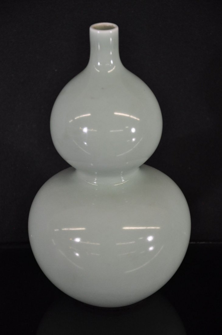 19TH C. CHINESE GREEN GLAZED PORCELAIN GOURD V: Green-glazed porcelain gourd vase, China 19th c., six Chinese characters marked on base. 9"T