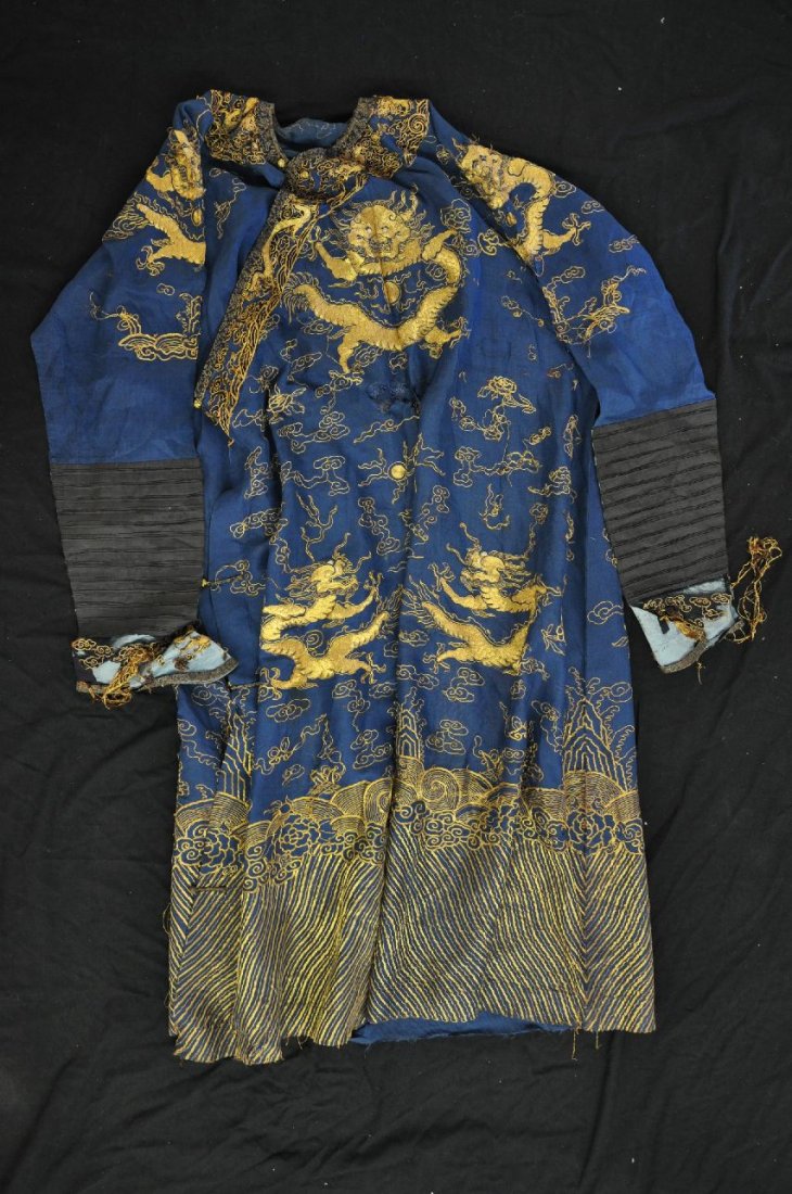 CHINESE IMPERIAL FAMILY EMPEROR DRAGON CLOTHES: Dragon clothes, China, total nine dragons, gold string sewn into fabric, some damage on the sleeve opening, and gilded bronze buttons. From Dr. Gregorio Walker Newland's collection, estate from Connec