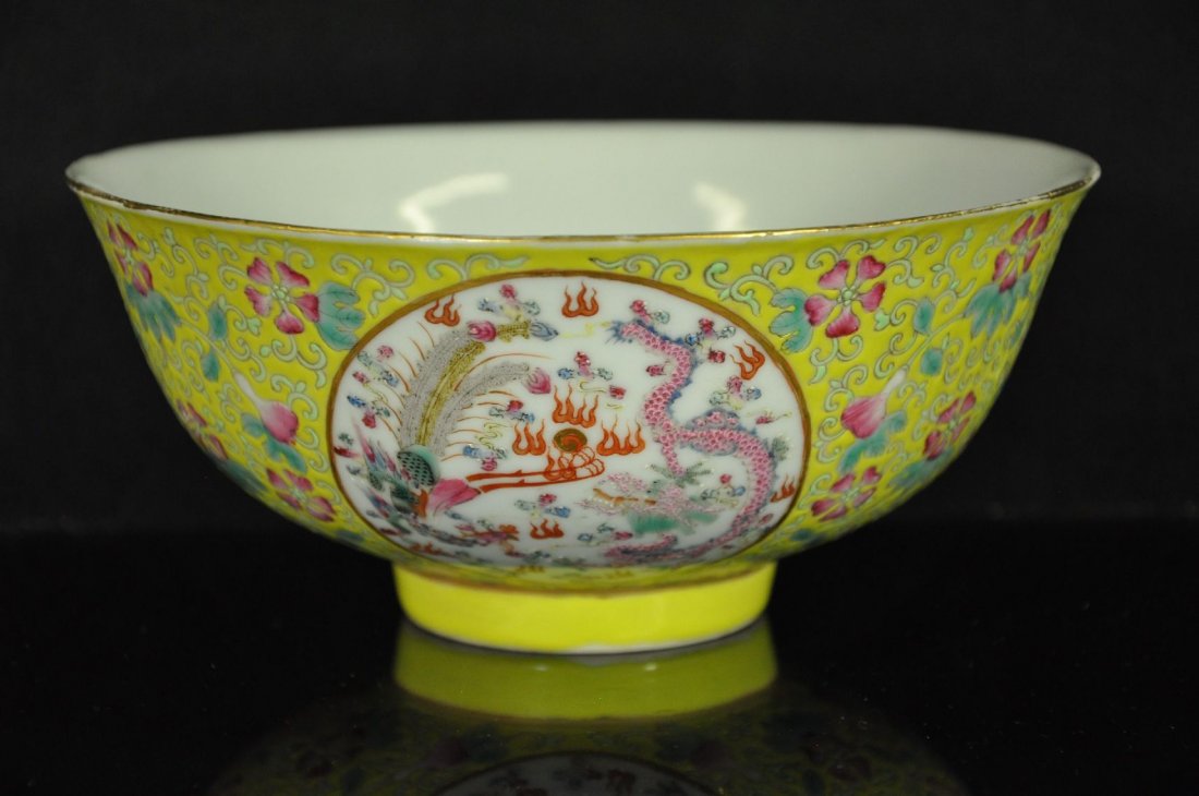 19TH C. CHINESE FAMILLE ROSE PORCELAIN BOWL: Porcelain bowl with Yellow glaze on the outside and base, center picture includes a dragon with a fire ball. six Chinese characters marked on base. From Dr. Gregorio Walker Newland's collection, estat