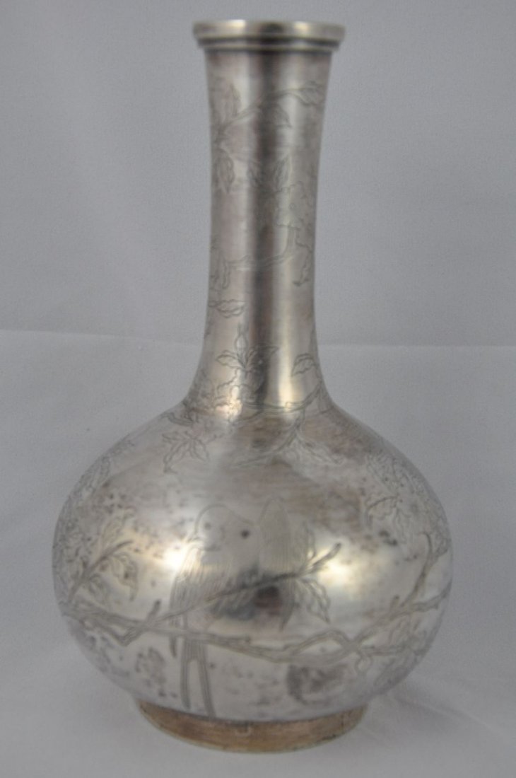 19 C. EXPORTED SILVER OF CHINESE VASE. 10.8OZ: Export silver Chinese vase, carved peony tree and birds around the body, museum collection marked l1965.1.189, and Chinese company mark on base. From Dr. Gregorio Walker Newland's collection, estate f
