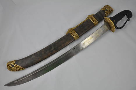 CHINESE SWORD AND SCABBARD: Chinese sword has a carved spinach green jade handle, the blade inscribed with qianlong reign. 36"L with scabbard, blade is 27"L