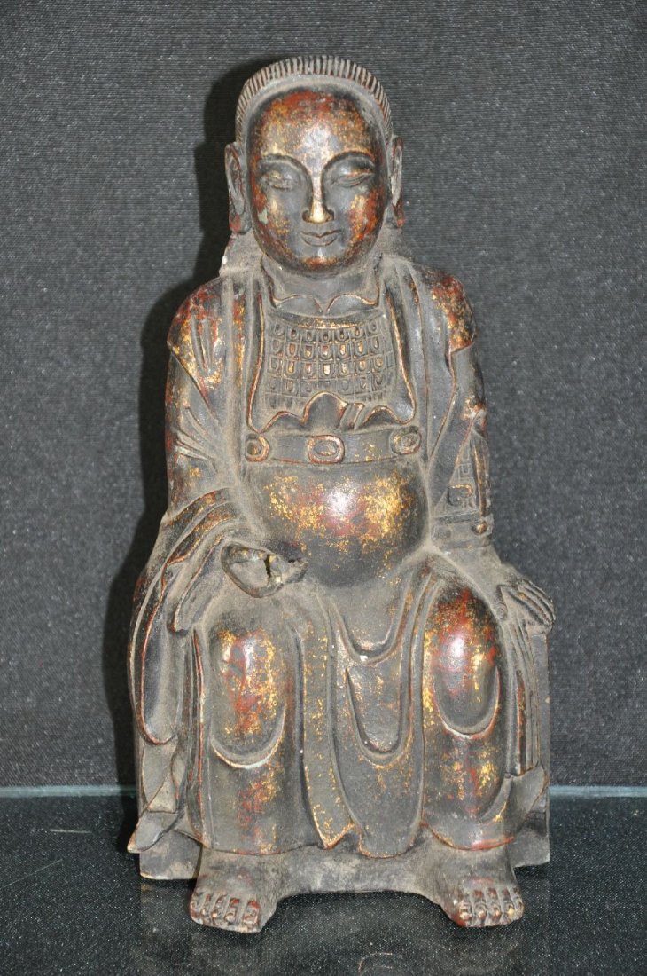 CHINESE BRONZE STATUE: Bronze statue of a warrior with long hair, wearing armor, sitting down. 10"T