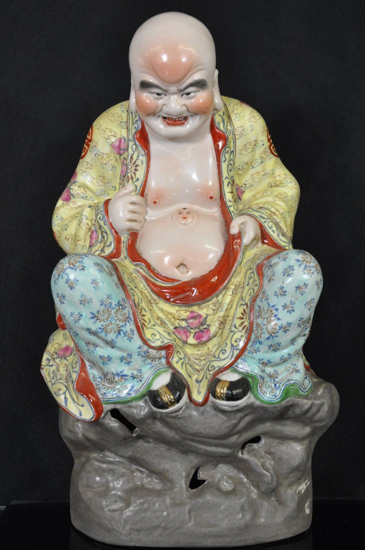 CHINESE FAMILLE ROSE PORCELAIN STATUE: Porcelain statue, Buddha sitting on a mountain with both hands holding his clothes. maker's marked carved on base. 15"T