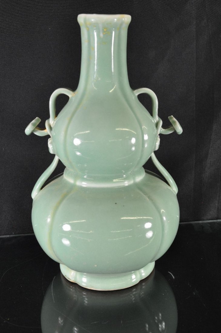 19TH C. CHINESE GREEN GLAZE PORCELAIN GOURD VA: Porcelain vase, gourd shaped vase, with two ruyi handles, three Chinese characters marked on base. 14"T