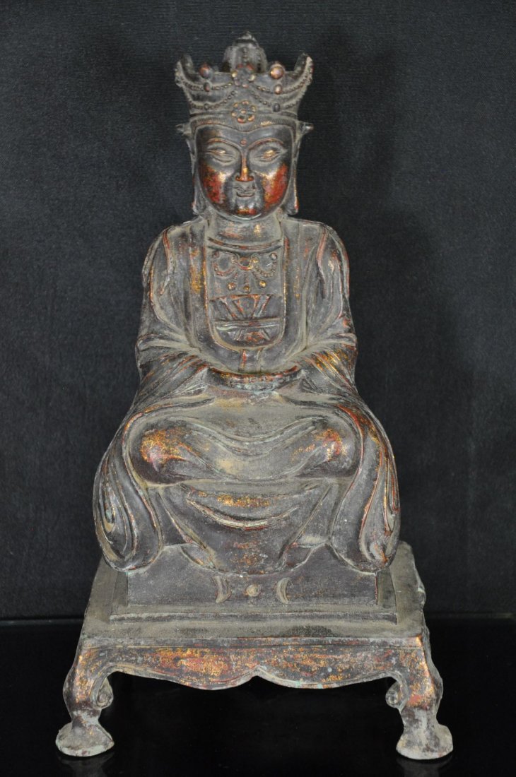 CHINESE BRONZE STATUE: Bronze statue, of immortal sitting cross legged, both hands are together, sitting on a stool. 13"T
