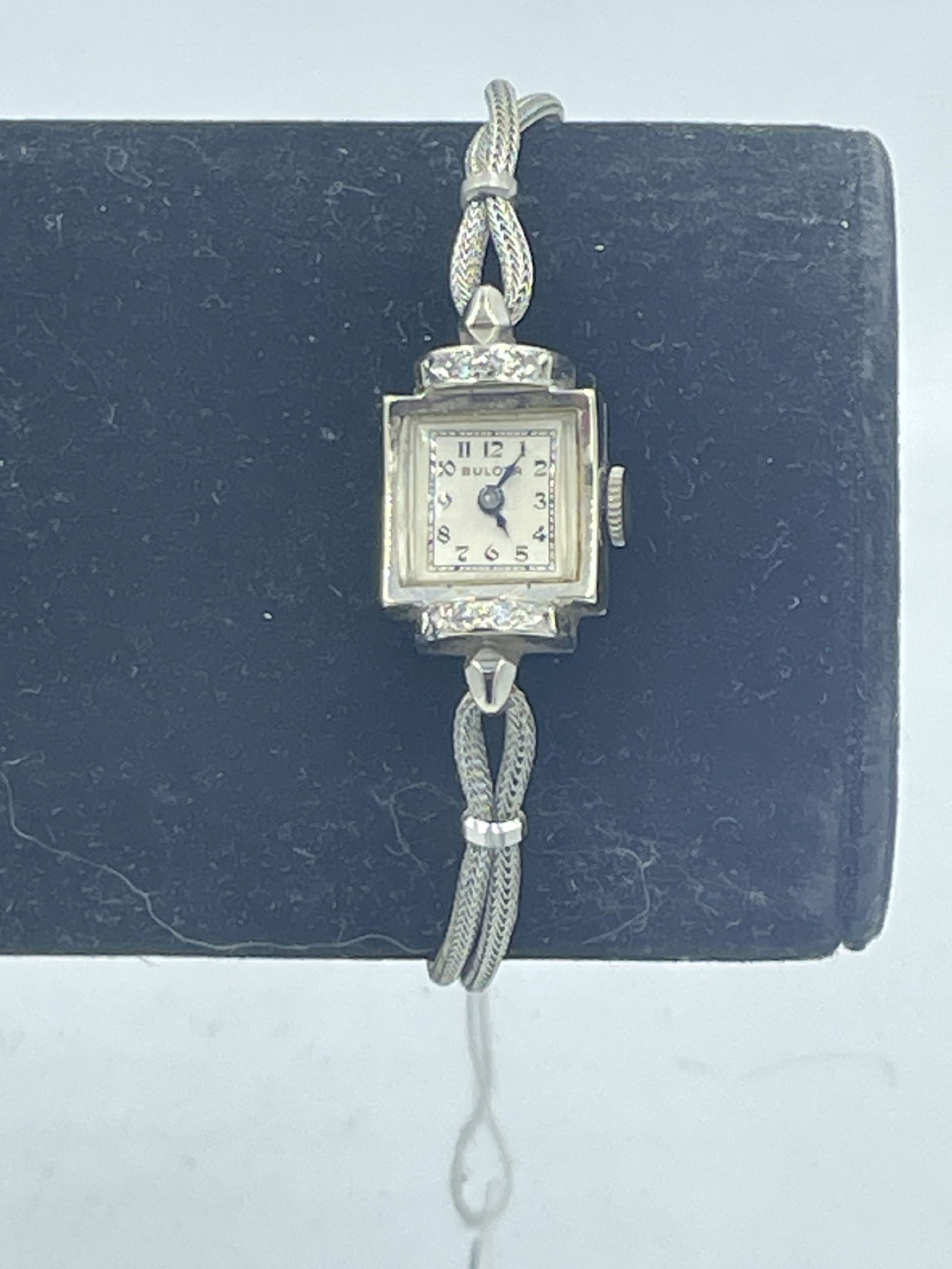 A BULOVA 14K GOLD LADIES WATCH WITH DIAMONDS: A BULOVA 14K GOLD LADIES WATCH WITH DIAMONDS
