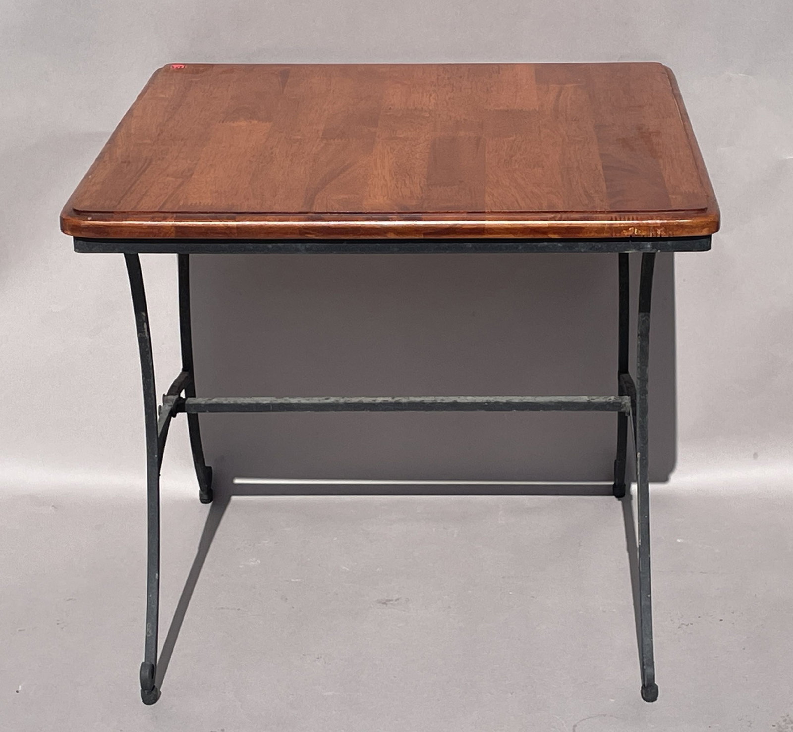 TEAK SIDE TABLE WITH A CAST IRON BASE, 22" X 22" X 21": TEAK SIDE TABLE WITH A CAST IRON BASE, 22" X 22" X 21"