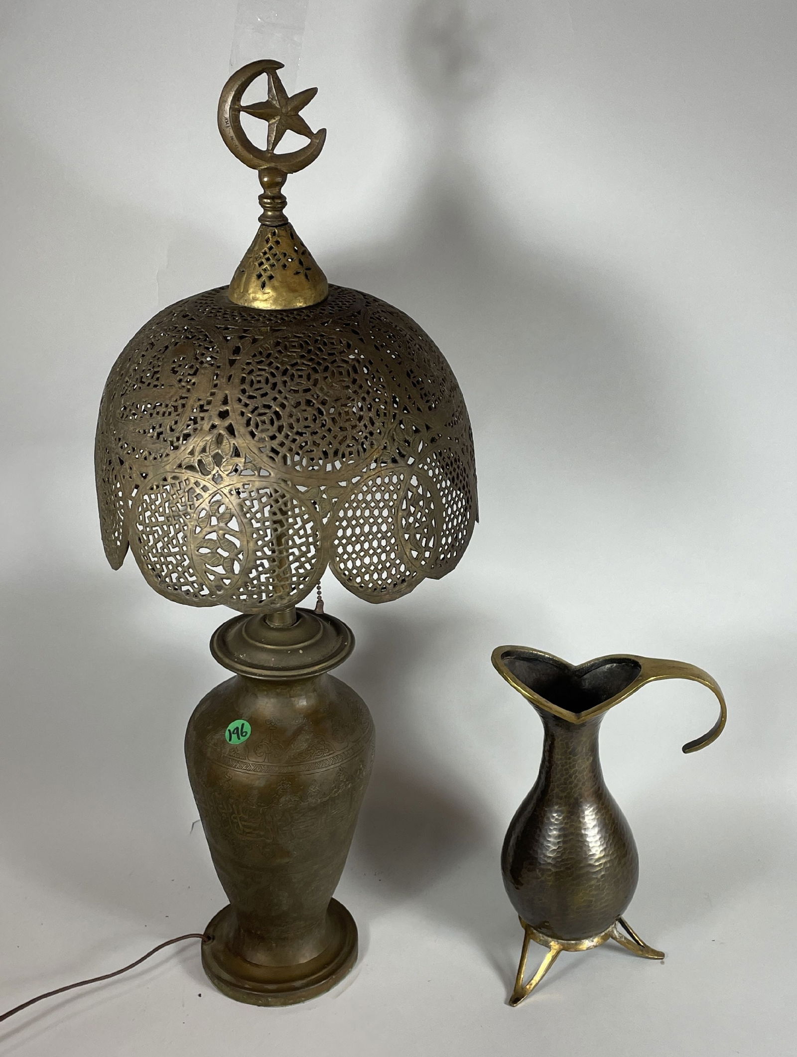 AN ANTIQUE COPPER LAMP AND A HAMMERED BRASS ISRAELI EWER, 27" TALL AND 12" TALL (1 of 7)