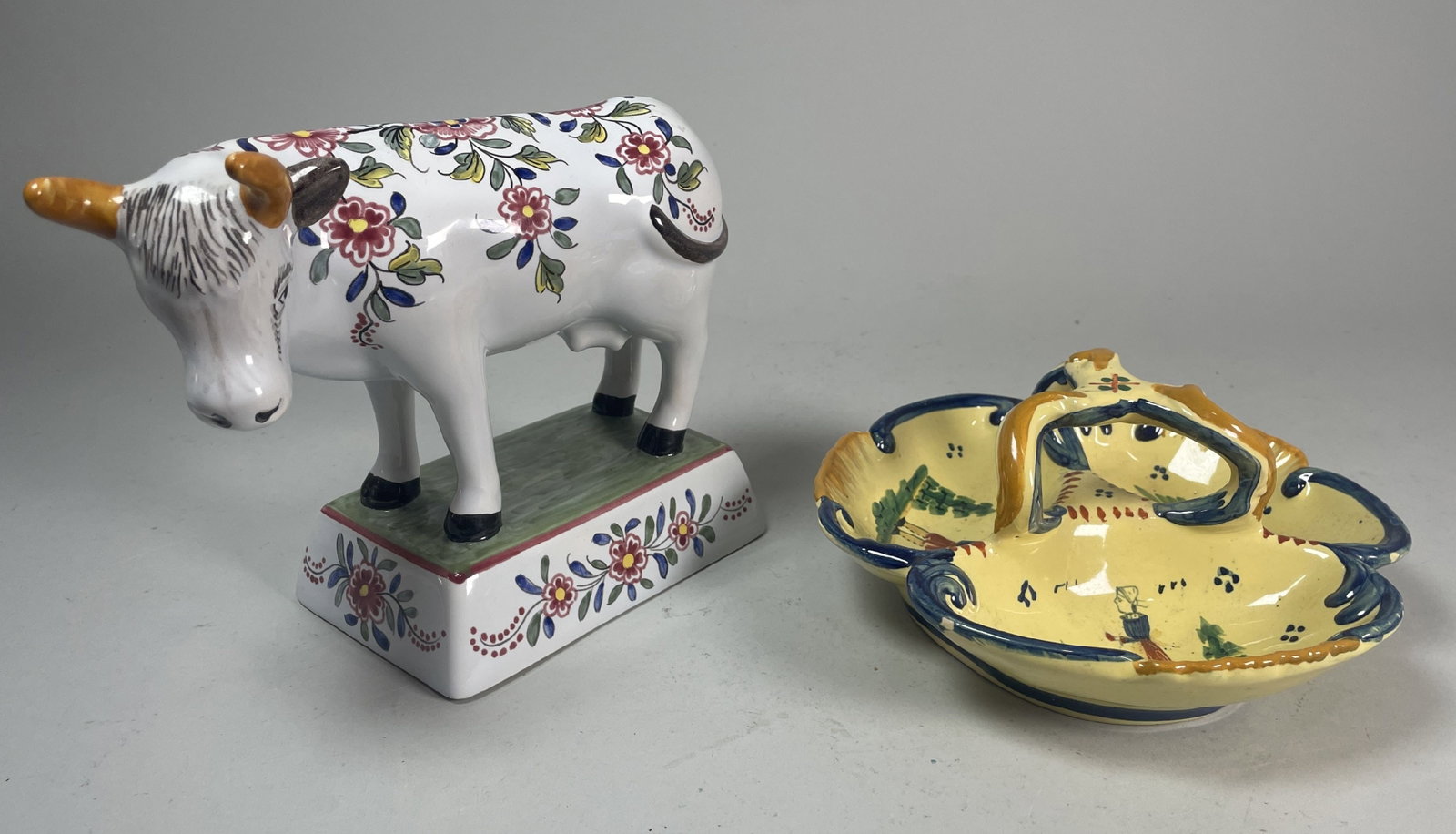 FRENCH FAEINCE COW FOR TIFFANY AND A QUIMPER DISH, 9" X 7": FRENCH FAEINCE COW FOR TIFFANY AND A QUIMPER DISH, 9" X 7"