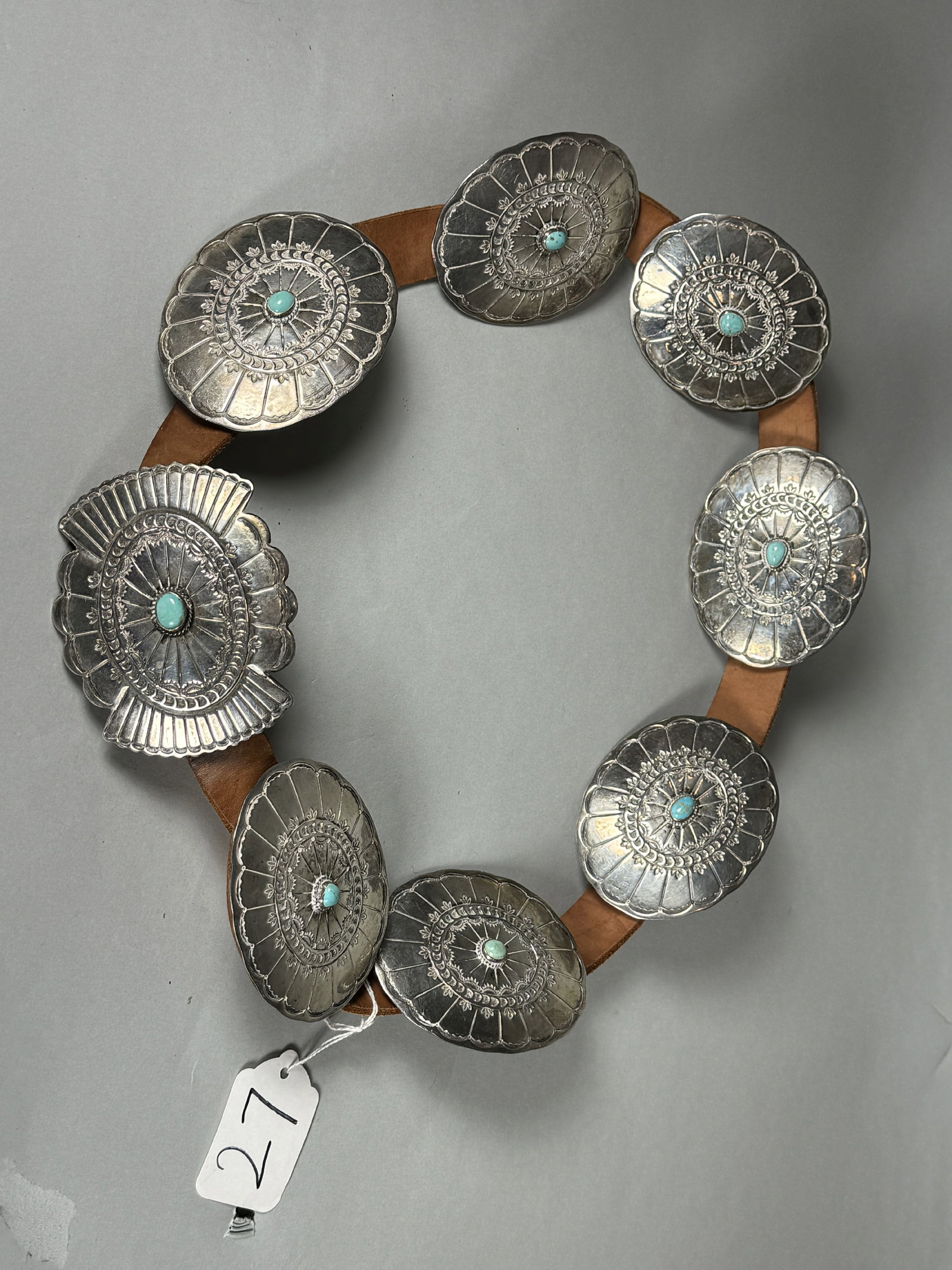 A LARGE STERLING SILVER CONCHA BELT, 749.6 GRAMS AND 44.5" LONG: A LARGE STERLING SILVER CONCHA BELT, 749.6 GRAMS AND 44.5" LONG