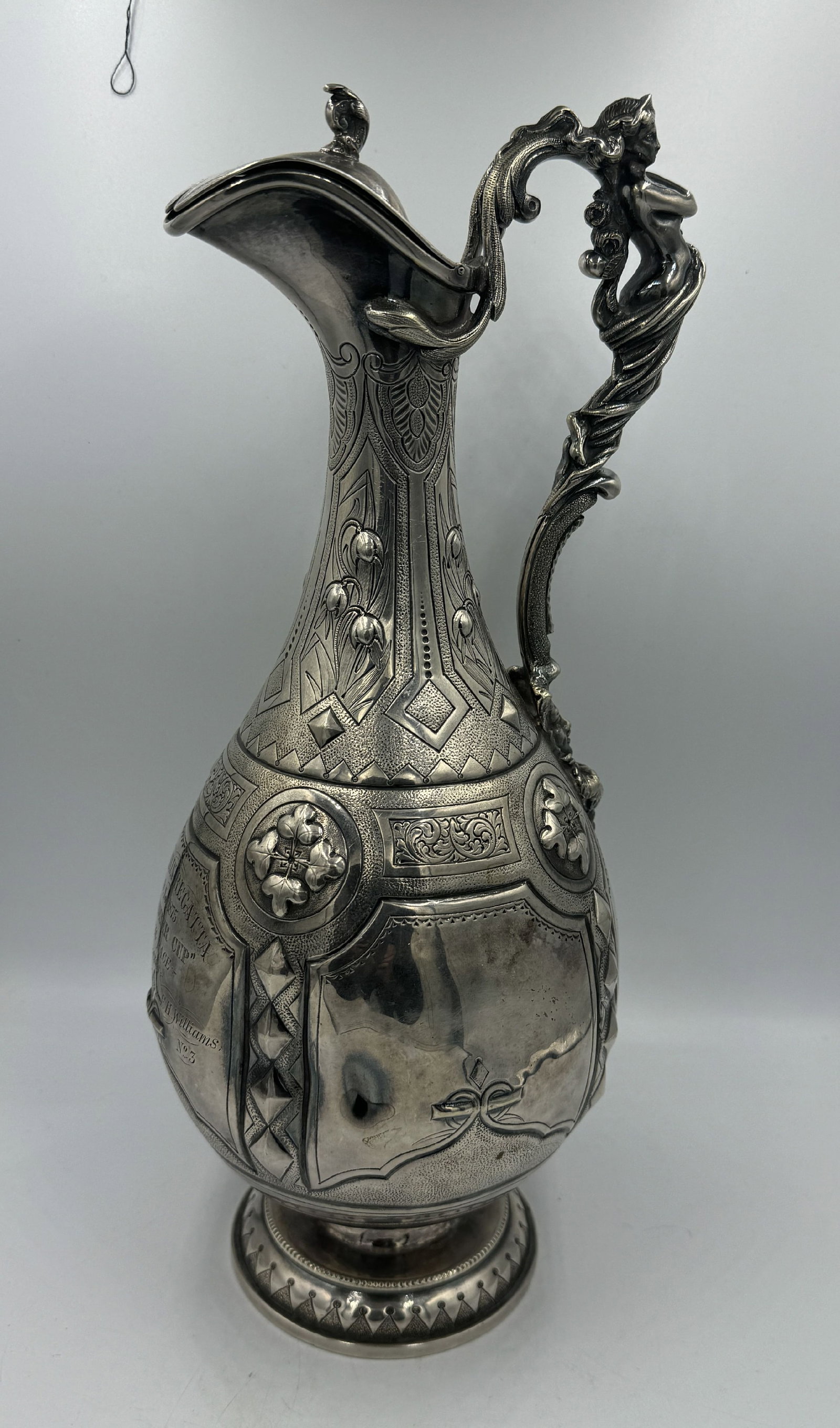 1875 COIN SILVER FIGURAL SAILING TROPHY: 1875 COIN SILVER FIGURAL SAILING TROPHY, 13" TALL AND 28.5 OZT