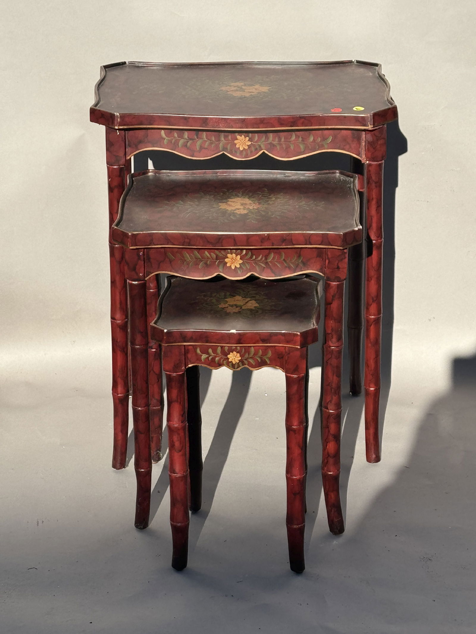 A SET OF THREE LACQUERED VICTORIAN NESTING TABLES, 21" X 15" X 27.5" AND SMALLER (1 of 6)
