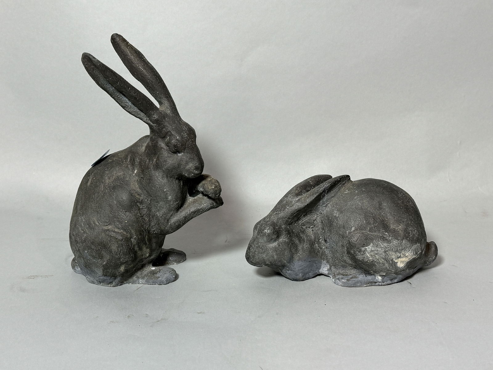 TWO CAST LEAD OR ZINC BUNNIES, 7" TALL AND 4" TALL: TWO CAST LEAD OR ZINC BUNNIES, 7" TALL AND 4" TALL