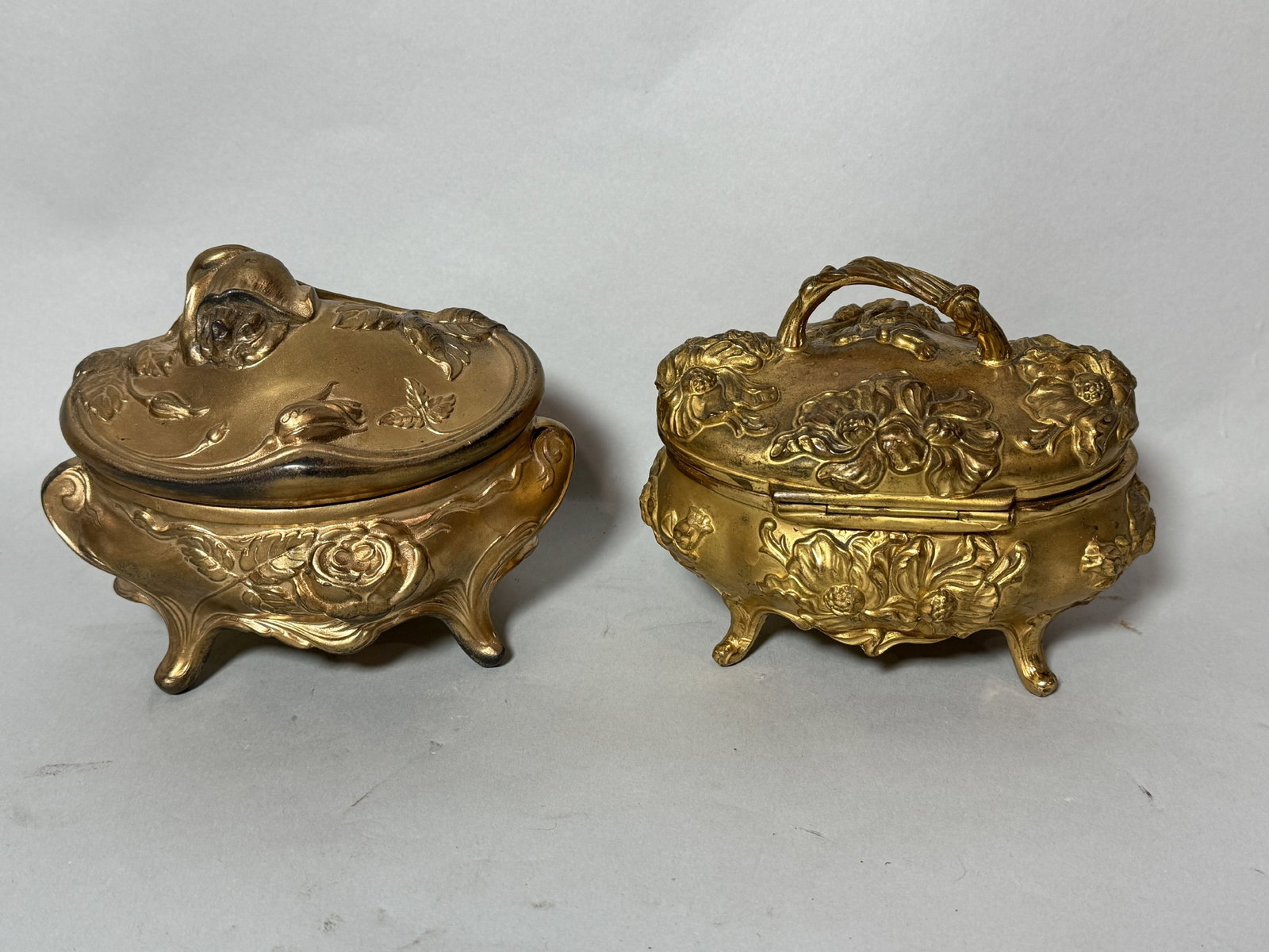 TWO GILT METAL CASKETS, 6" X 4" X 4": TWO GILT METAL CASKETS, 6" X 4" X 4"