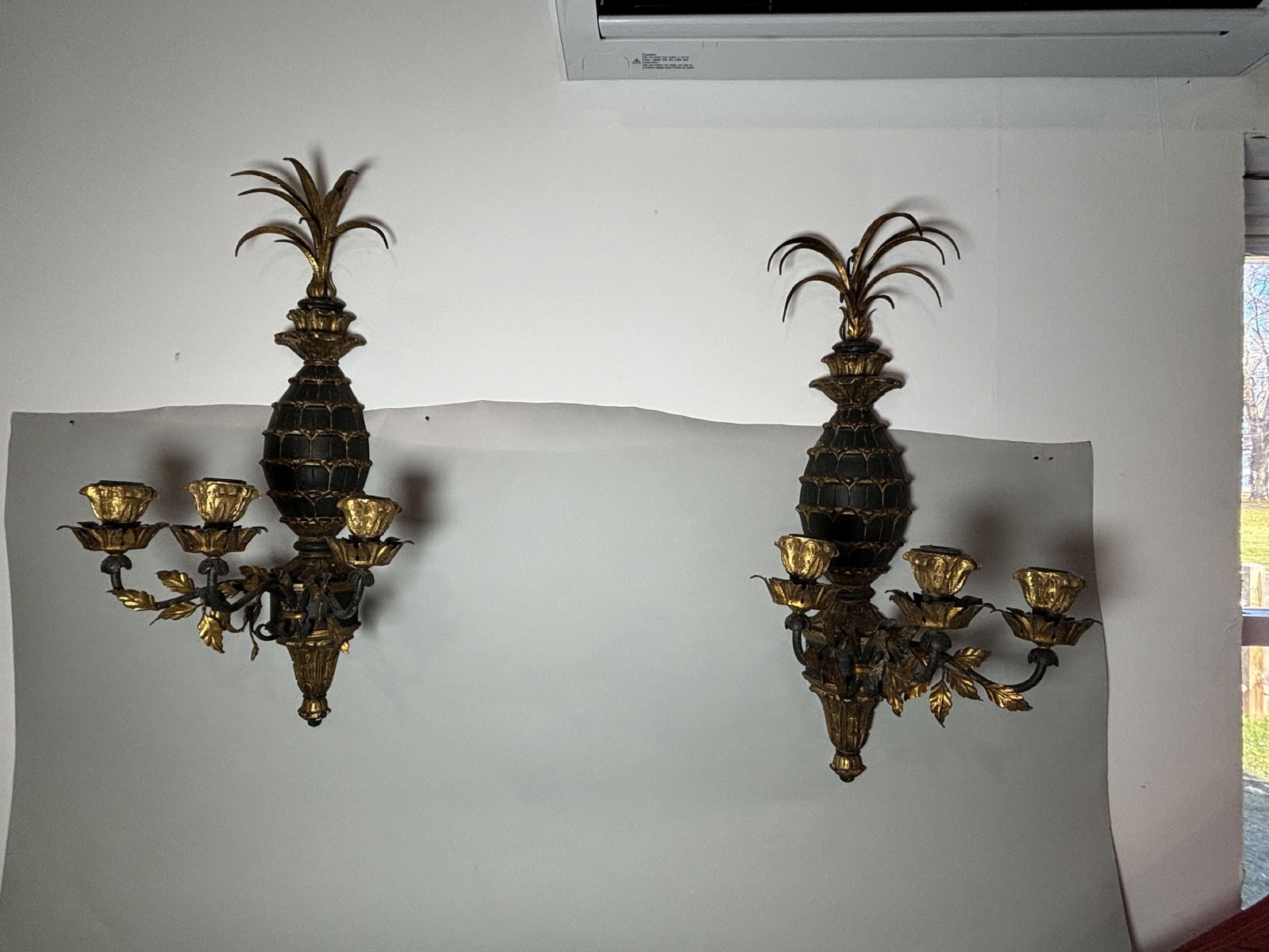 A PAIR OF PAINTED WOOD AND TOLEWARE PINEAPPLE SCONCES, 14" X 10" X 27": A PAIR OF PAINTED WOOD AND TOLEWARE PINEAPPLE SCONCES, 14" X 10" X 27"