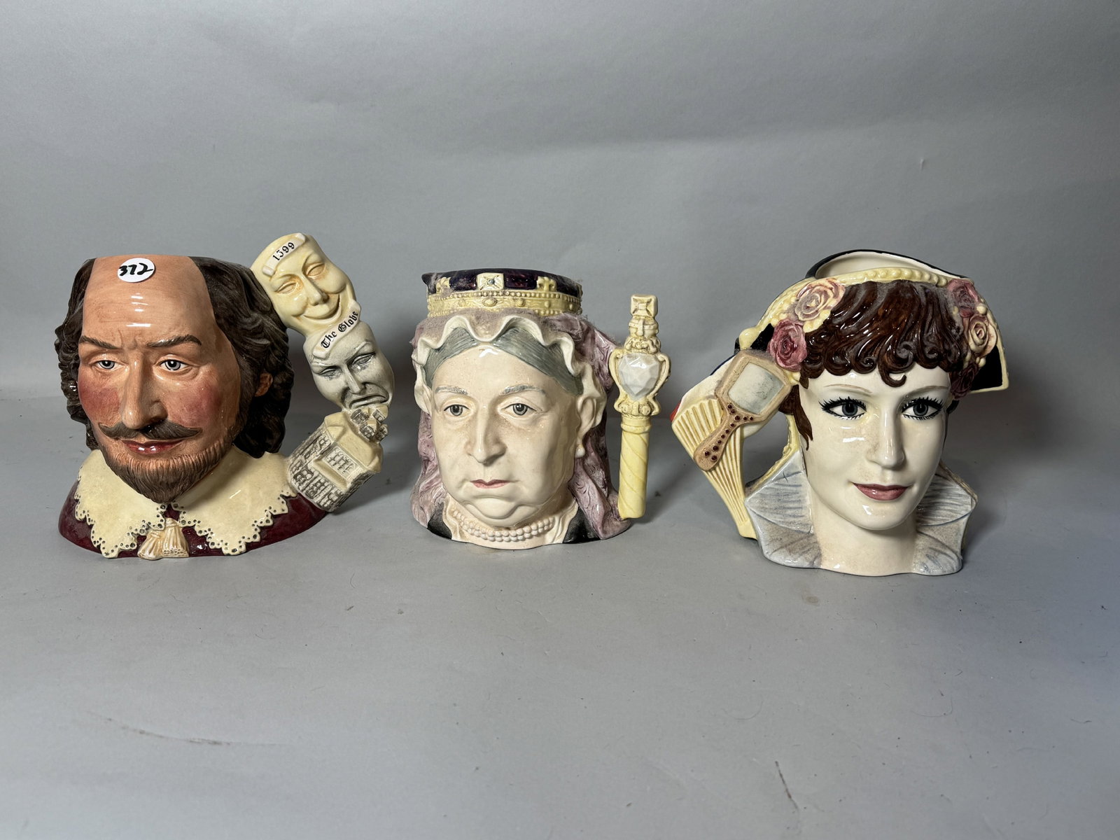 THREE LARGE ROYAL DAULTON CHARACTER MUGS, SHAKESPEARE, NAPOLEON/JOSEPHINE, AND QUEEN VICTORIA. 7": THREE LARGE ROYAL DAULTON CHARACTER MUGS, SHAKESPEARE, NAPOLEON/JOSEPHINE, AND QUEEN VICTORIA. 7" EACH