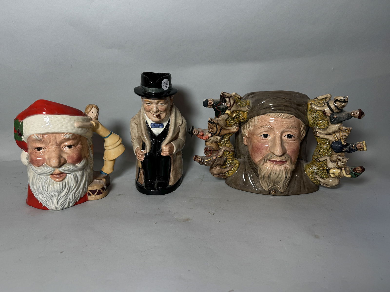 THREE LARGE ROYAL DAULTON CHARACTER MUGS, JEFFREY CHAUCER, WINSTON CHURCHILL, AND SANTA. 9" AND (1 of 4)