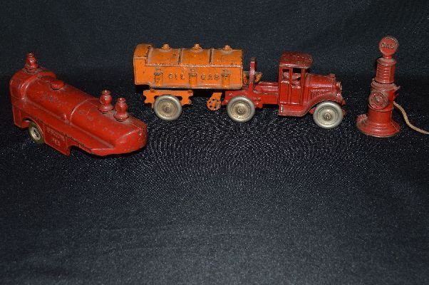 Early cast iron pumper truck by Ives or Kenton: Early cast iron pumper truck by Ives or Kenton, with 2 other pieces, 10.5"L