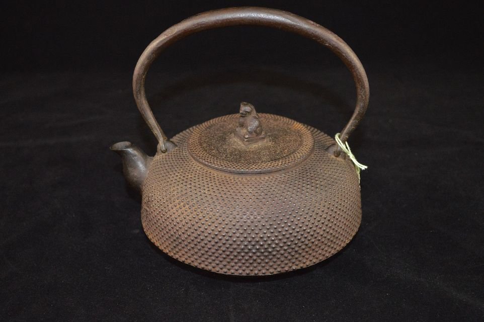 Metal teapot: metal teapot, japan, signed on the left of spout raised in the metal with a four character mark, circa early 20th, 7"T at handle