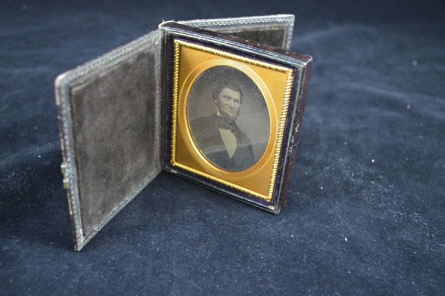 1/6th plate ambrotype of man housed in rare do: 1/6th plate ambrotype of man housed in rare double hinged Matthew Brady style case