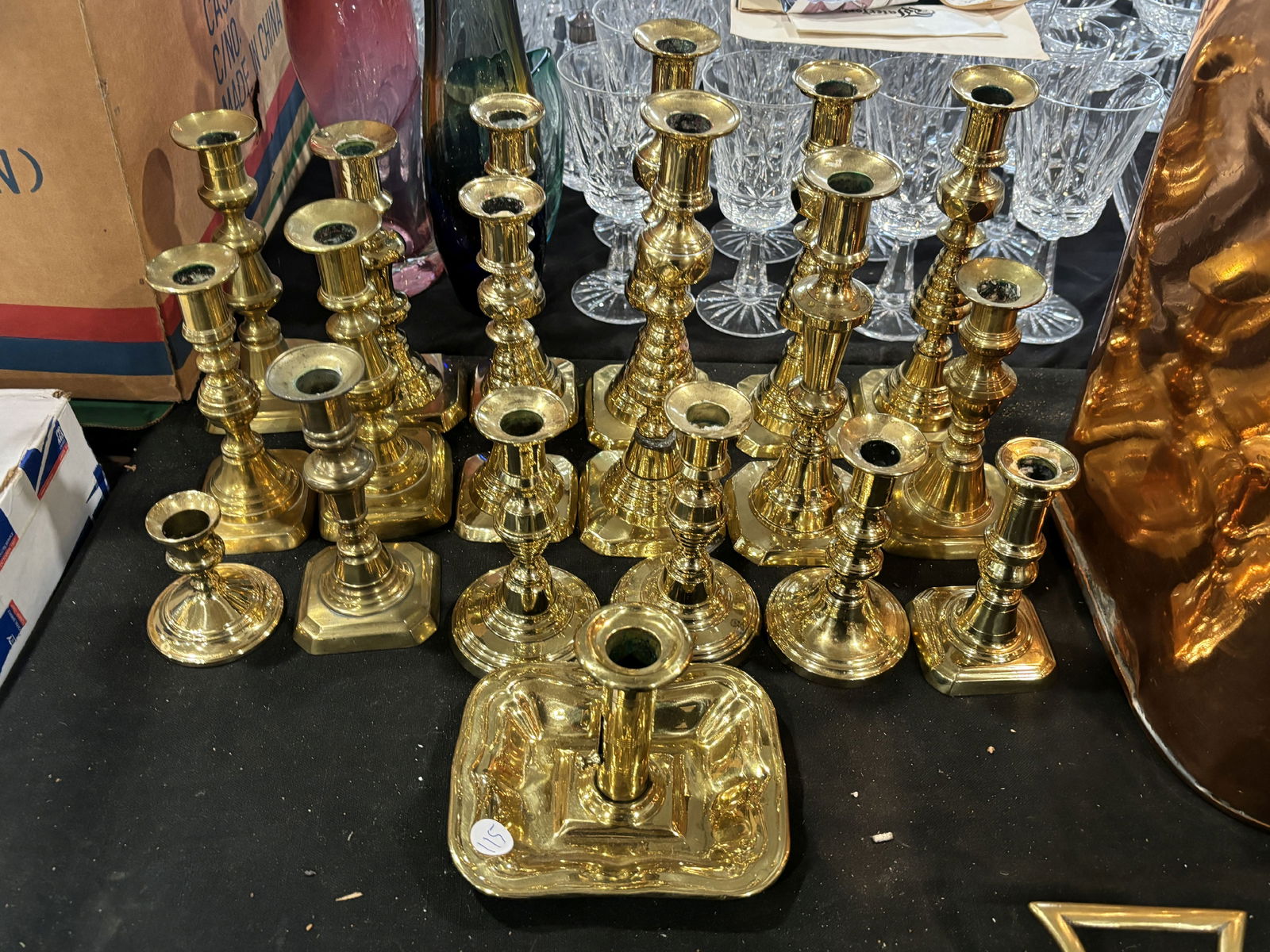 NINETEEN 19TH CENTURY BRASS PUSH UP CANDLESTICKS, 10" AND SMALLER (1 of 6)