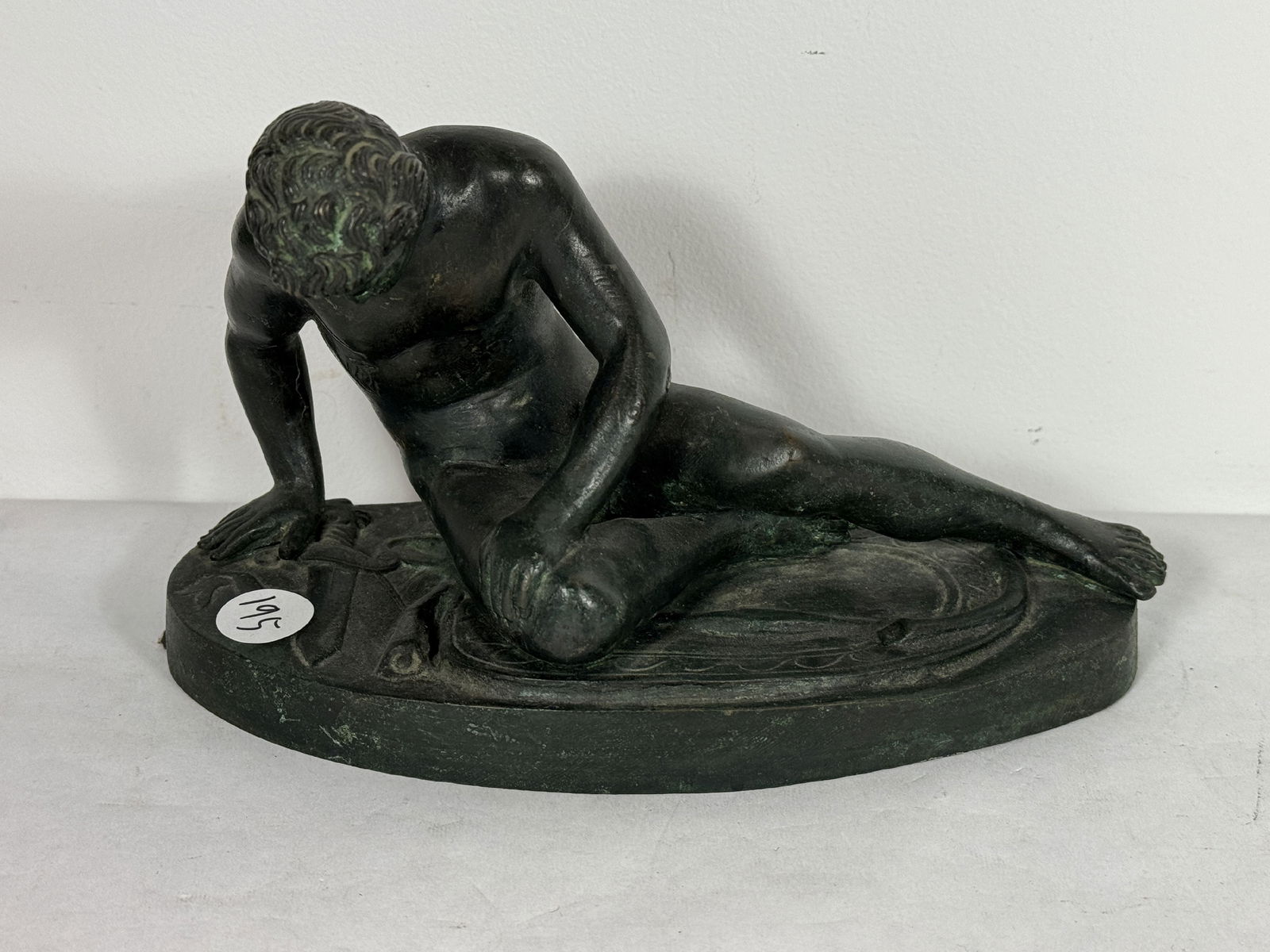 A SIGNED BRONZE FIGURE OF A MAN WITH SWORD, 8.5" X 4" X 5" (1 of 4)