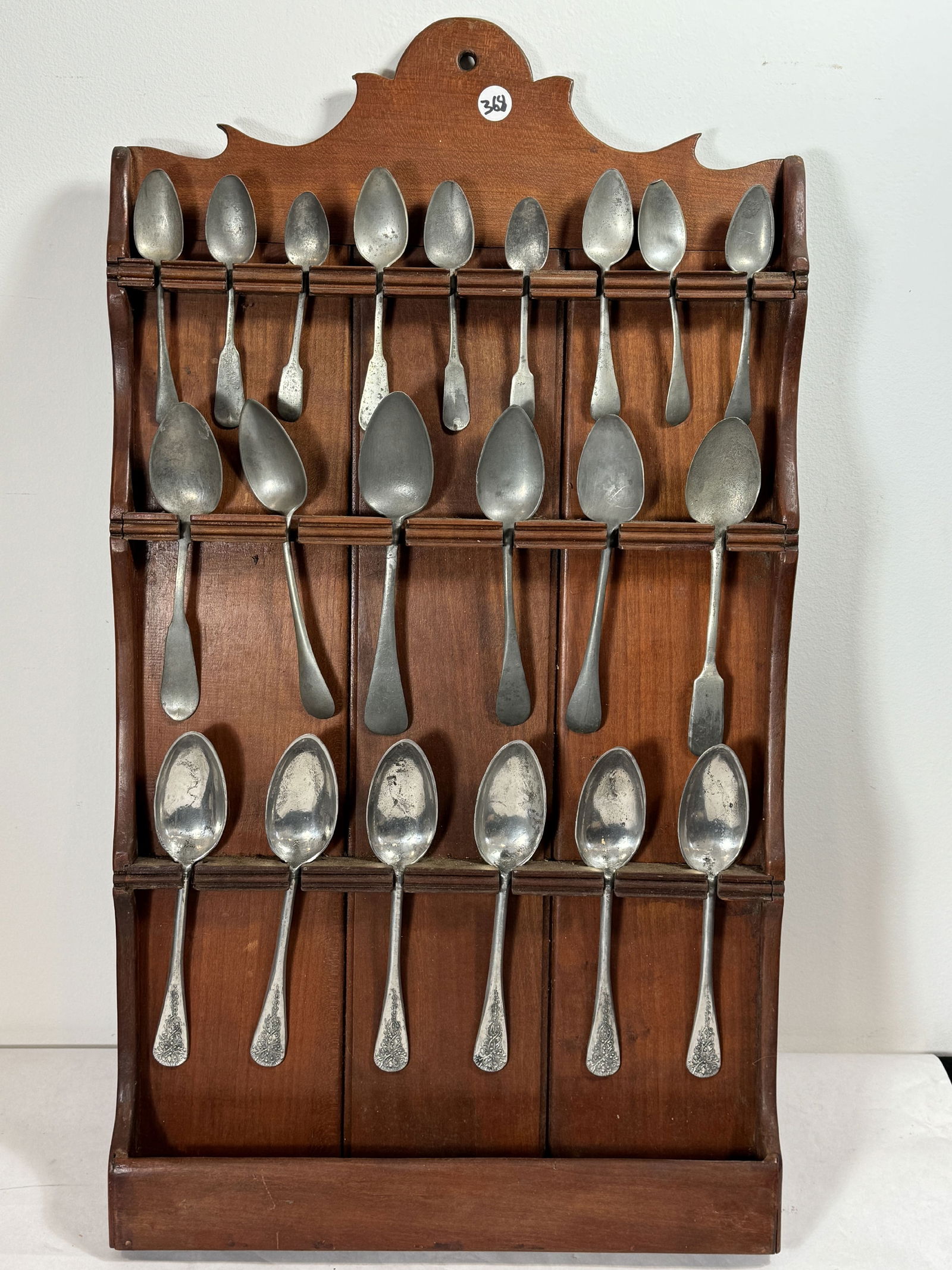 TWENTY ONE ANTIQUE PEWTER SPOONS IN RACK, 29" X 16" (1 of 10)
