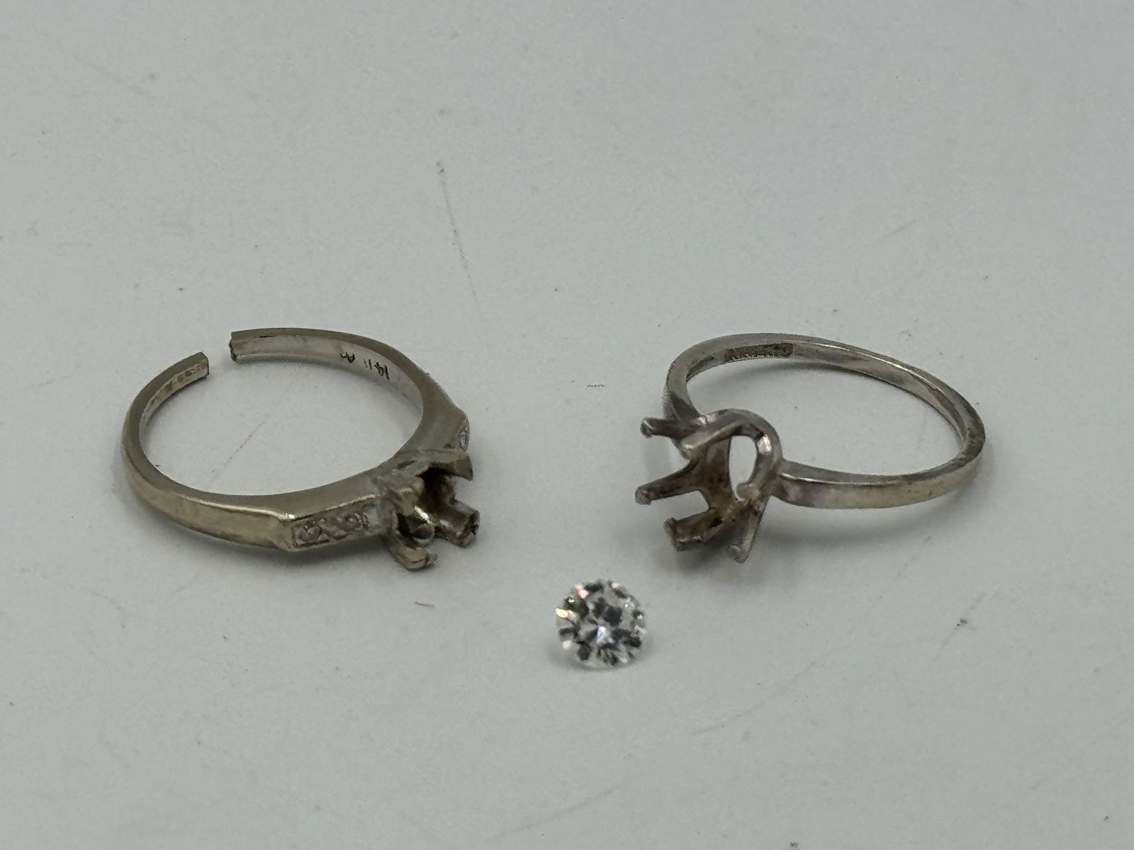 TWO 14K ENGAGEMENT RING SETTINGS AND ONE DIAMOND, 4 GRAMS. SIZE 7 AND 6.5 (1 of 9)