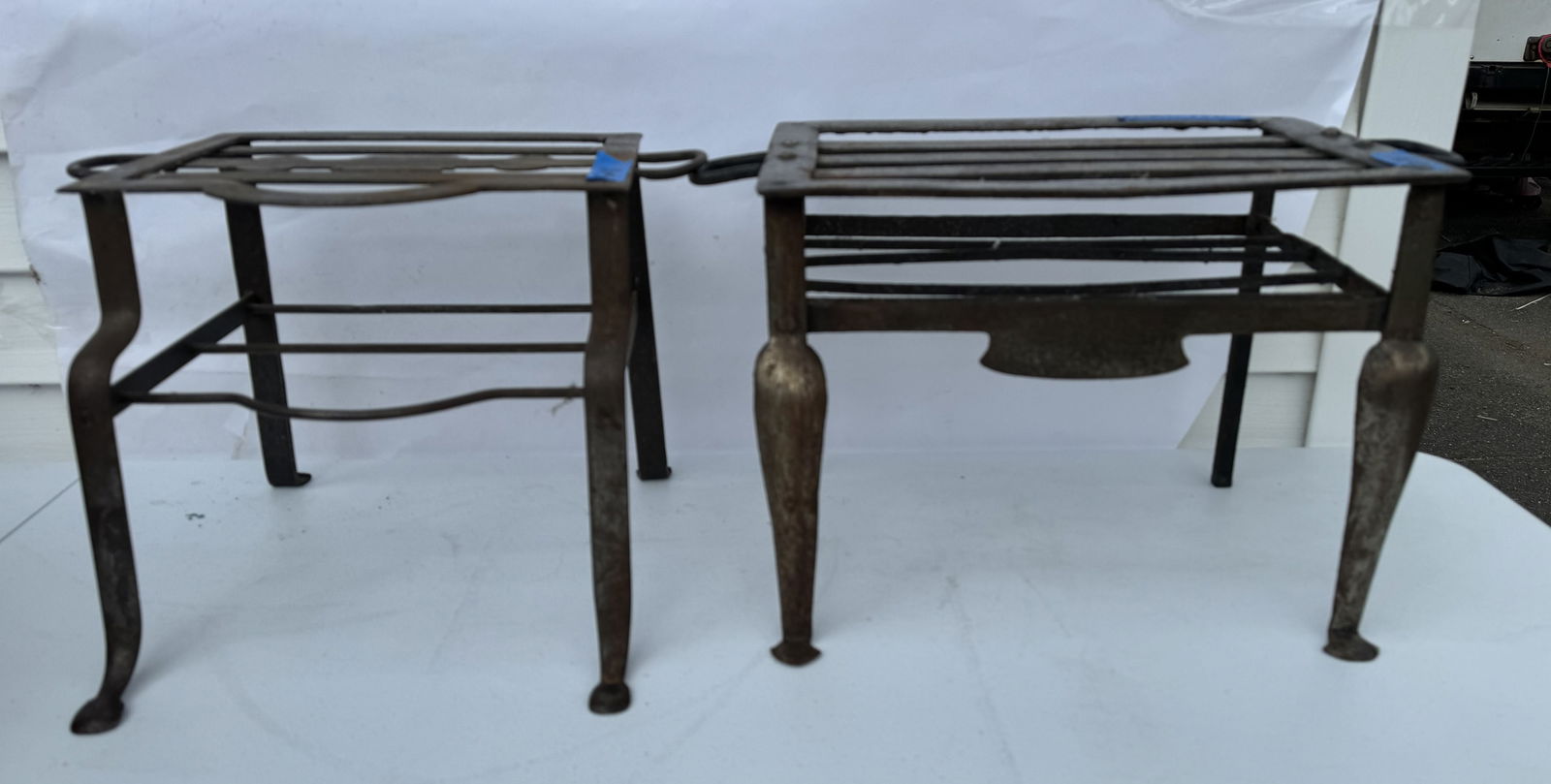 TWO EARLY BRASS AND IRON FOOTMAN (1 of 3)