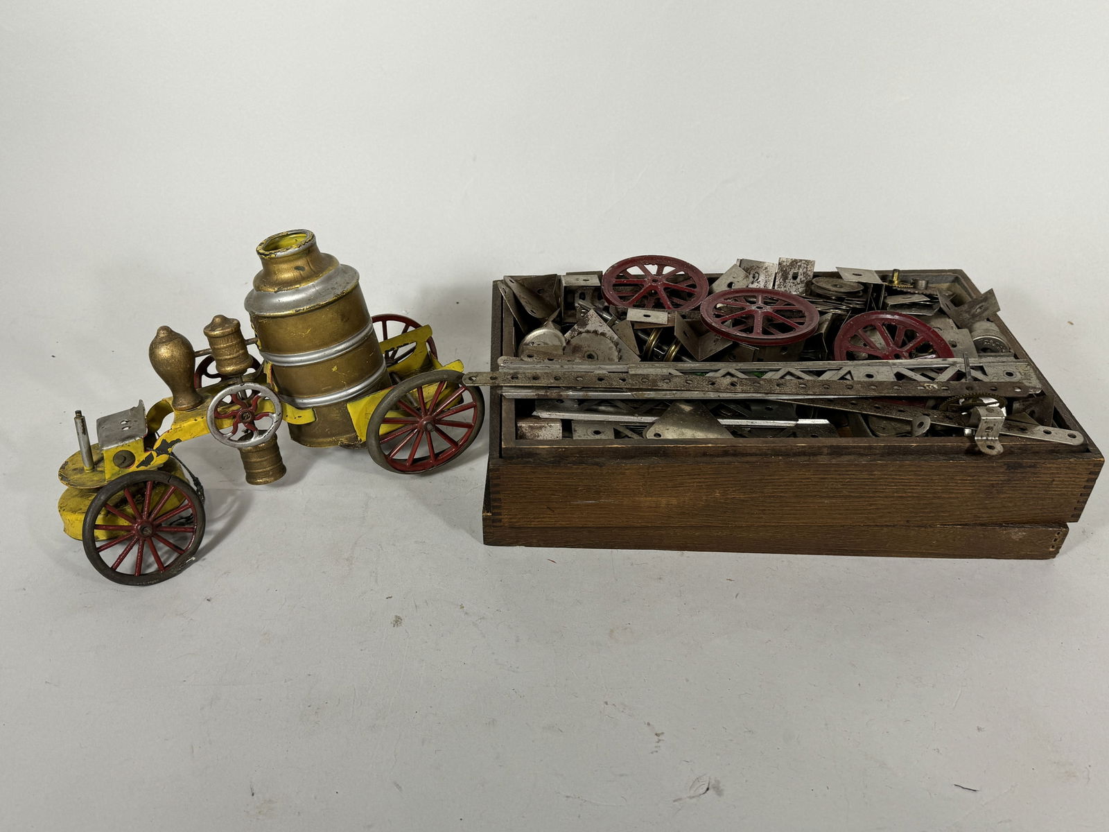 ANTIQUE TOY FIRE TRUCK AND AN ERECTOR SET, 10" AND SMALLER (1 of 6)