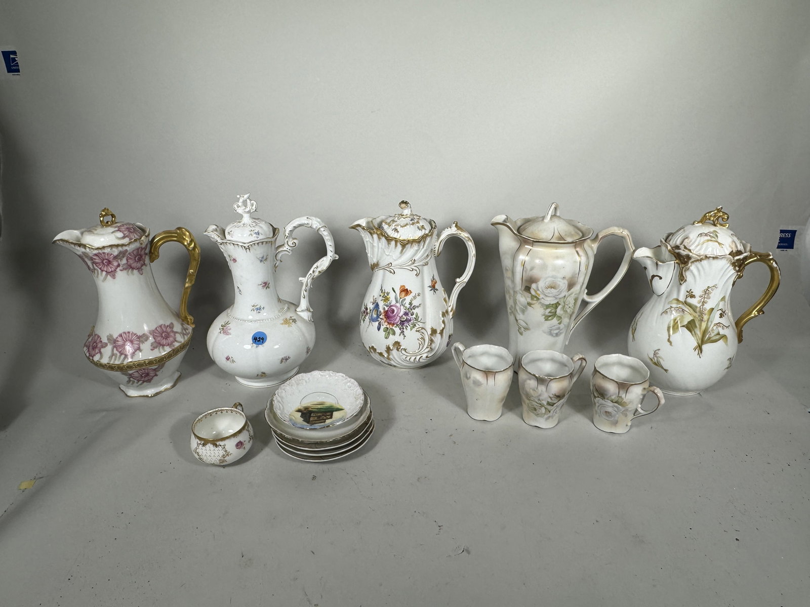 FIVE ANTIQUE PORCELAIN CHOCOLATE POTS: FIVE ANTIQUE PORCELAIN CHOCOLATE POTS