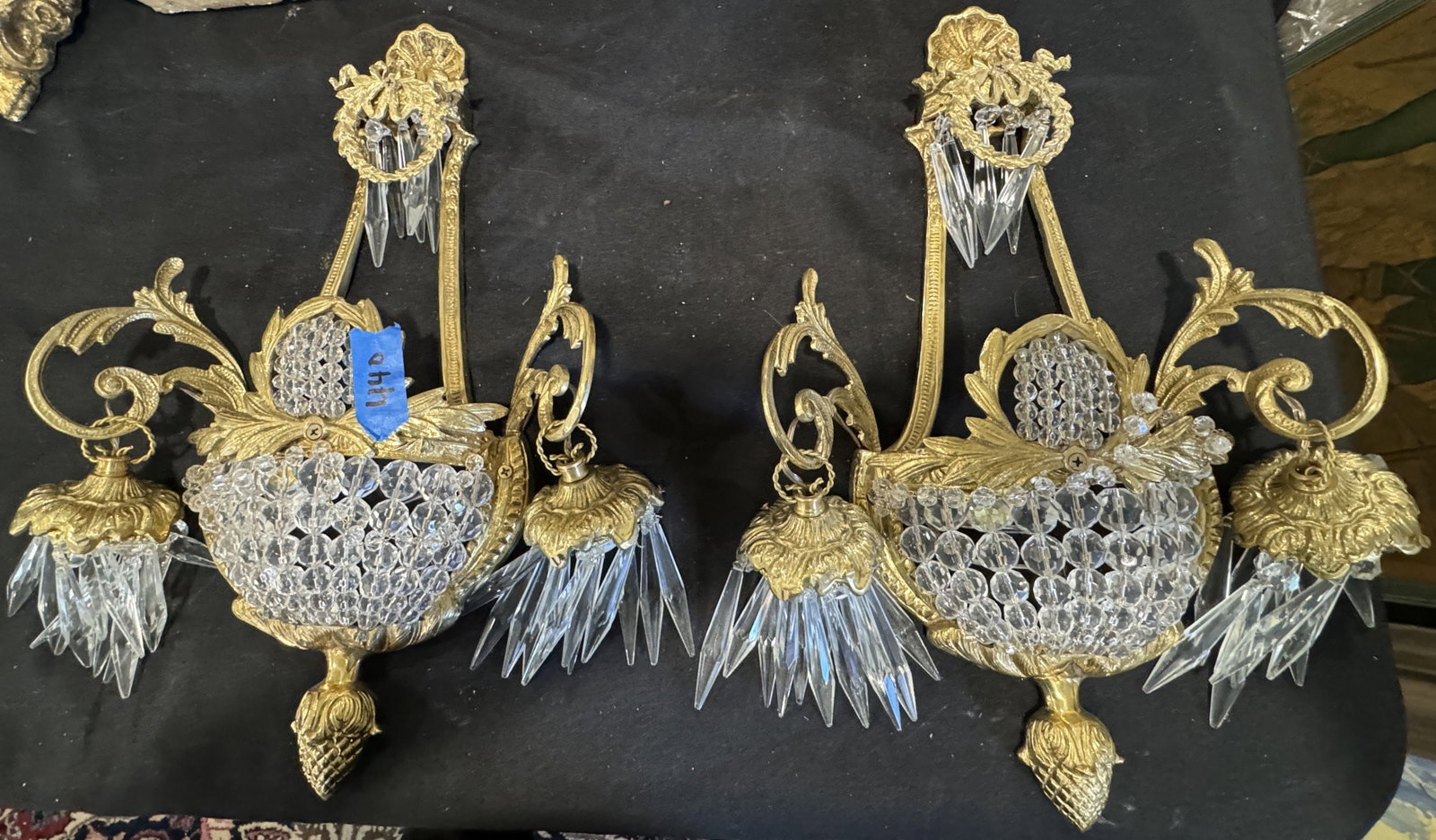 BRASS AND CRYSTAL SCONCES: BRASS AND CRYSTAL SCONCES