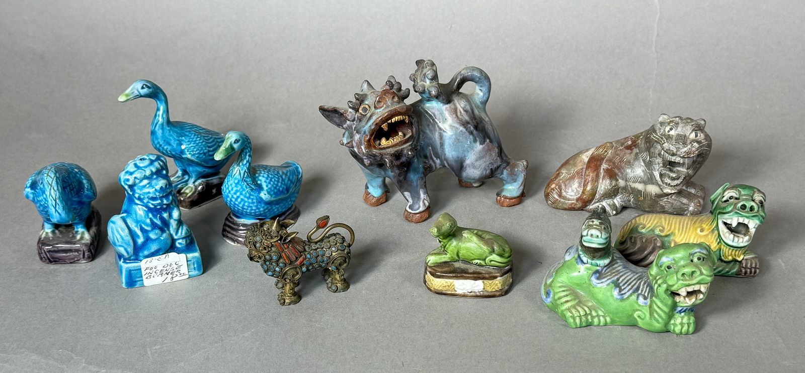 GROUPING OF ANTIQUE POTTERY AND STONE CHINESE FOO DOG FIGURES (1 of 12)