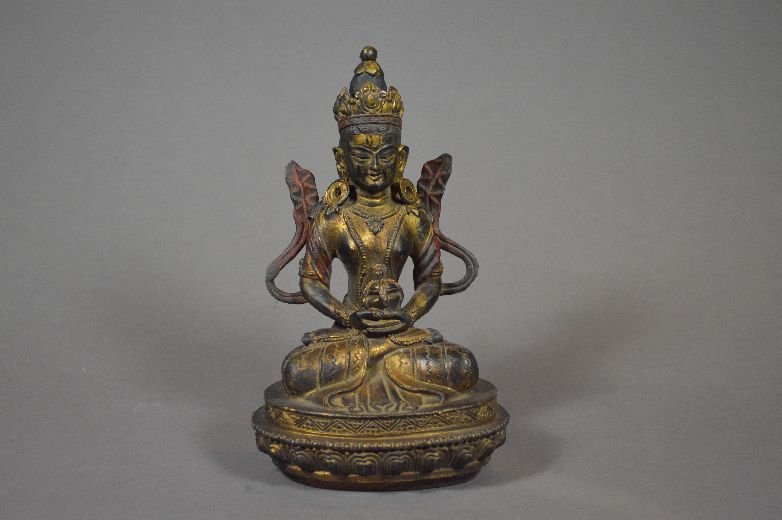 Gilt bronze statue: bronze statue, china, sitting cross-legged on lotus flower seat. And two hands placed in Buddhist concentration position. 8" x 5"