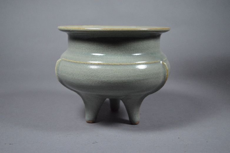 Light green glazed porcelain censer: censer, china, light green glazed censer with three foots. With original red lacquer box. 9" x 10"