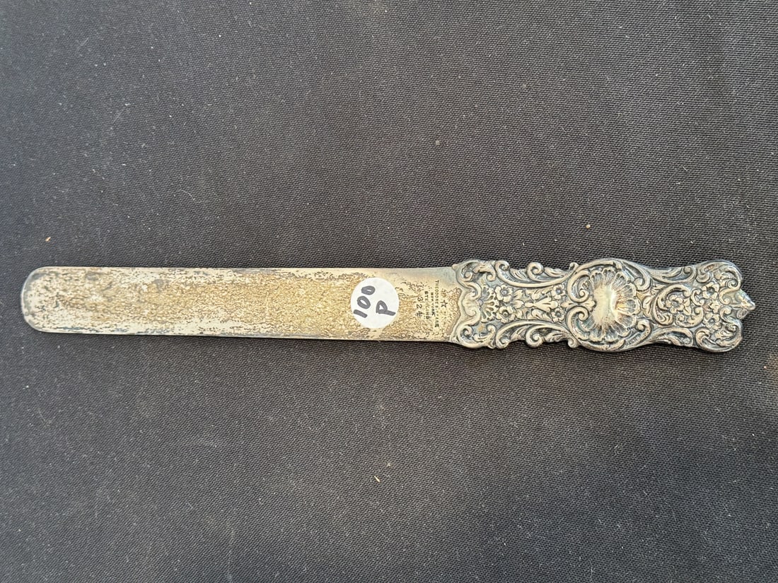 A STERLING SILVER THEODORE STARR LETTER OPENER, 3.4 TROY OUNCES: A STERLING SILVER THEODORE STARR LETTER OPENER, 3.4 TROY OUNCES