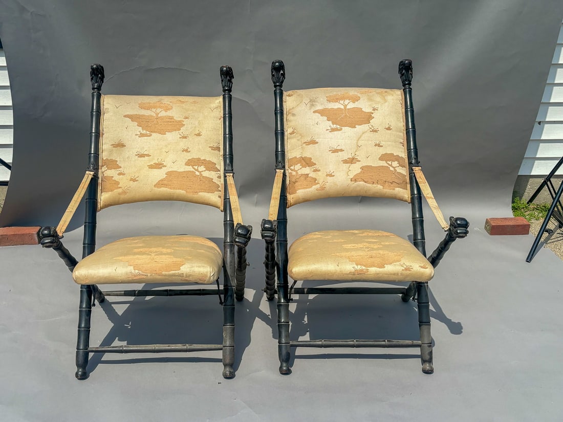 A PAIR OF CARVED CHINESE FOLDING CHAIRS W/ FOO DOG HEADS, 48" X 25" FOLDED AND 25" X 29" X 38" OPEN (1 of 8)