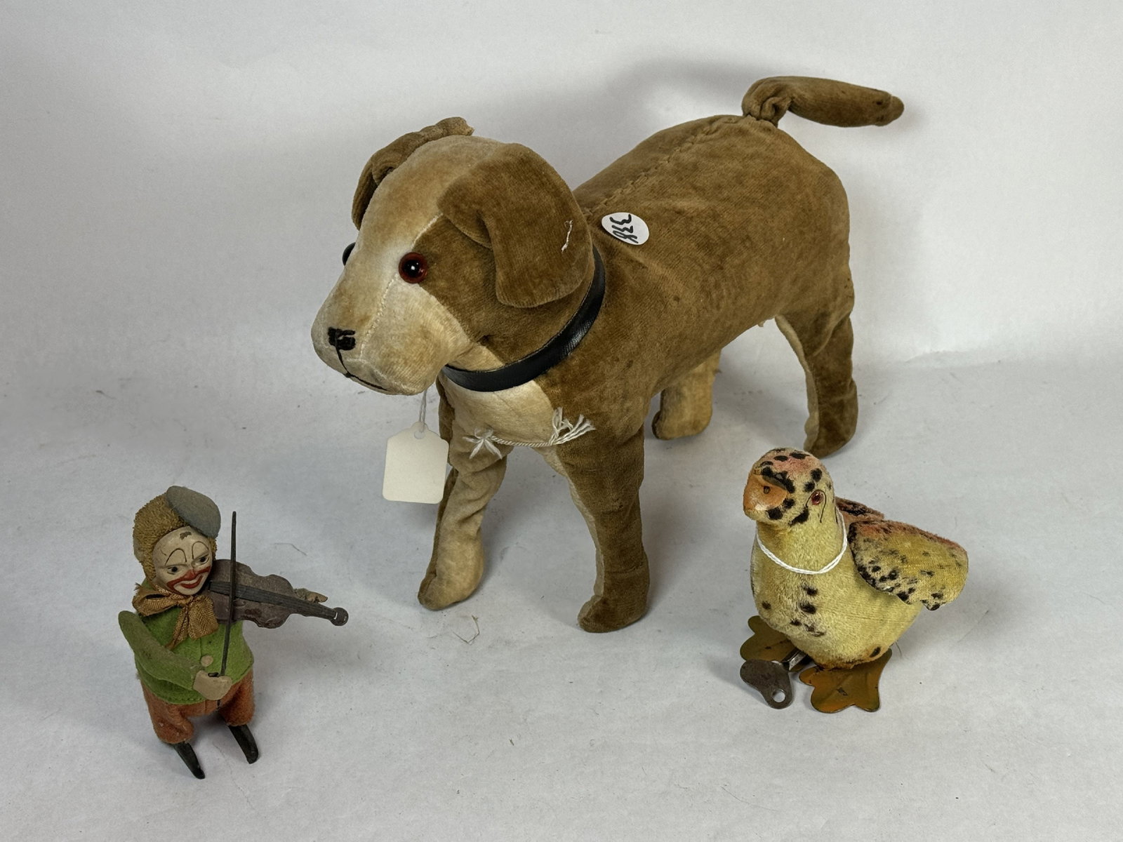 3 1950'S FELT COVERED WINDUP TOYS 12"X.5"X5": 3 1950'S FELT COVERED WINDUP TOYS 12"X.5"X5"