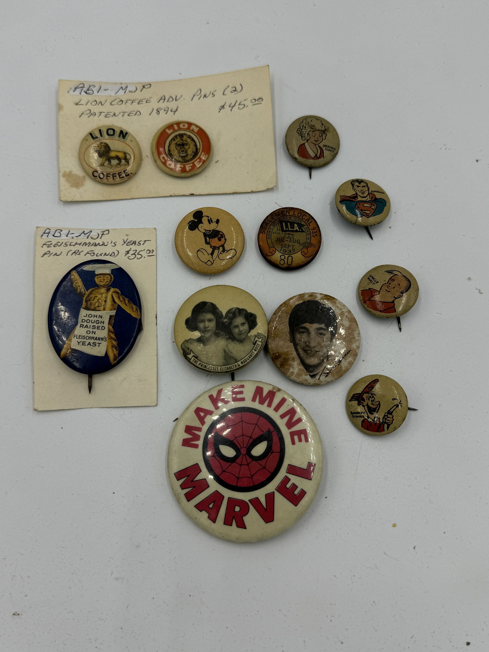 ANTIQUE BUTTON LOT INCLUDES MICKEY MOUSE, ORPHAN ANNIE, ETC (1 of 6)