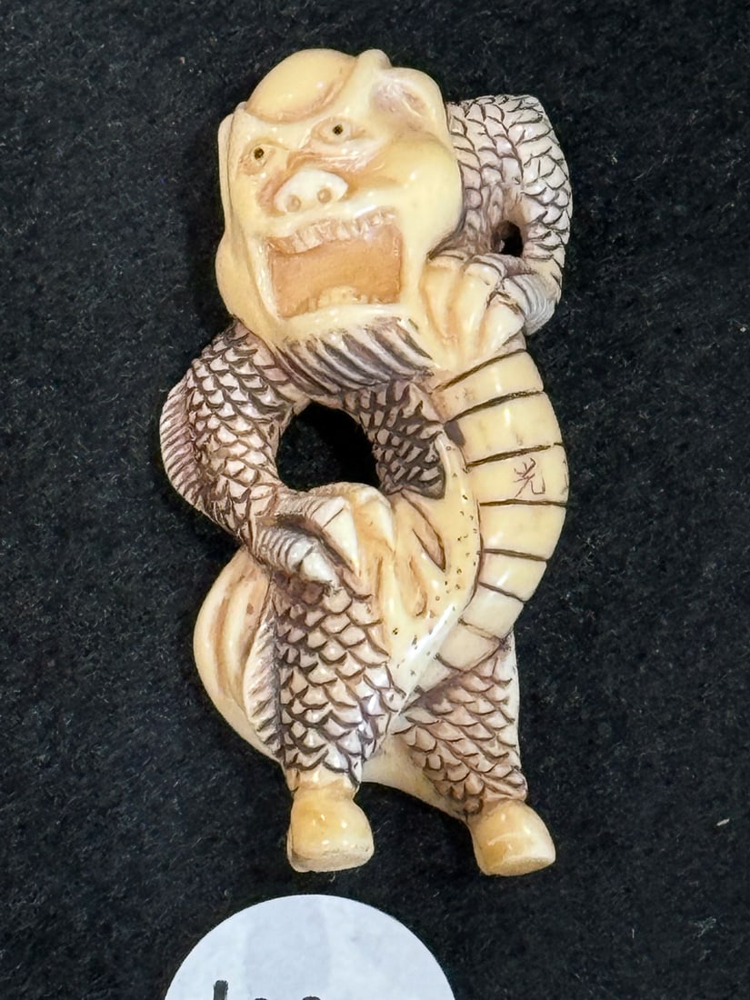 A JAPANESE NETSUKE, 2.5" (1 of 4)